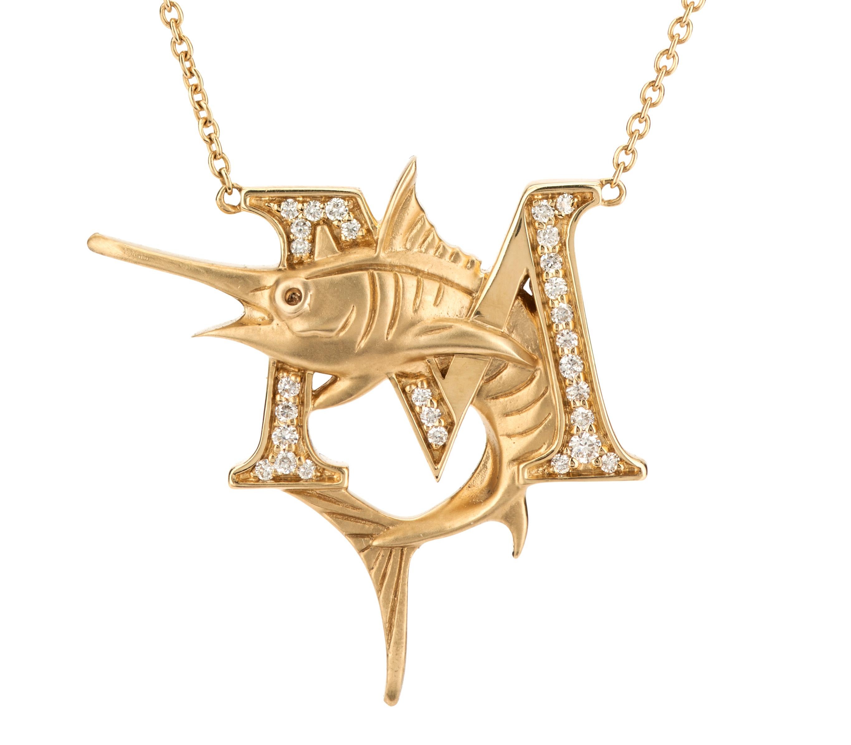 Uncover the mystery and magic of aquatic life with your own Fish Tales necklace and short story book written by the man himself – Stephen Webster. Embrace your initial with our ‘M is for Marlin’ diamond necklace featuring an 18 karat yellow gold