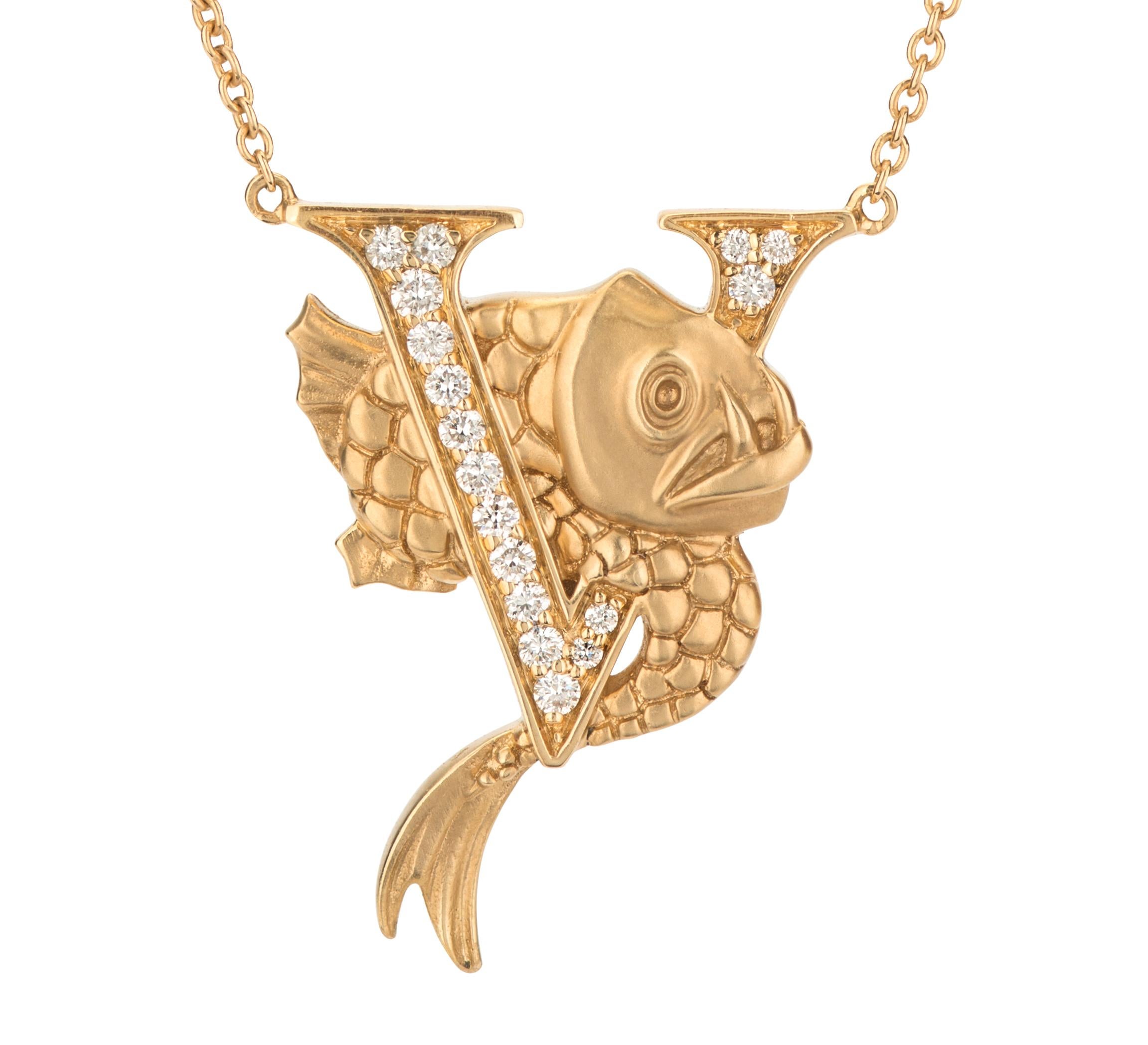 Embrace your initials and the fascinating sea world with our ‘V is for Viper Fish’ diamond necklace. Set on a 42cm gold chain this alphabet necklace features a matt finish viper fish entwined with a white diamond letter V.

Each necklace is