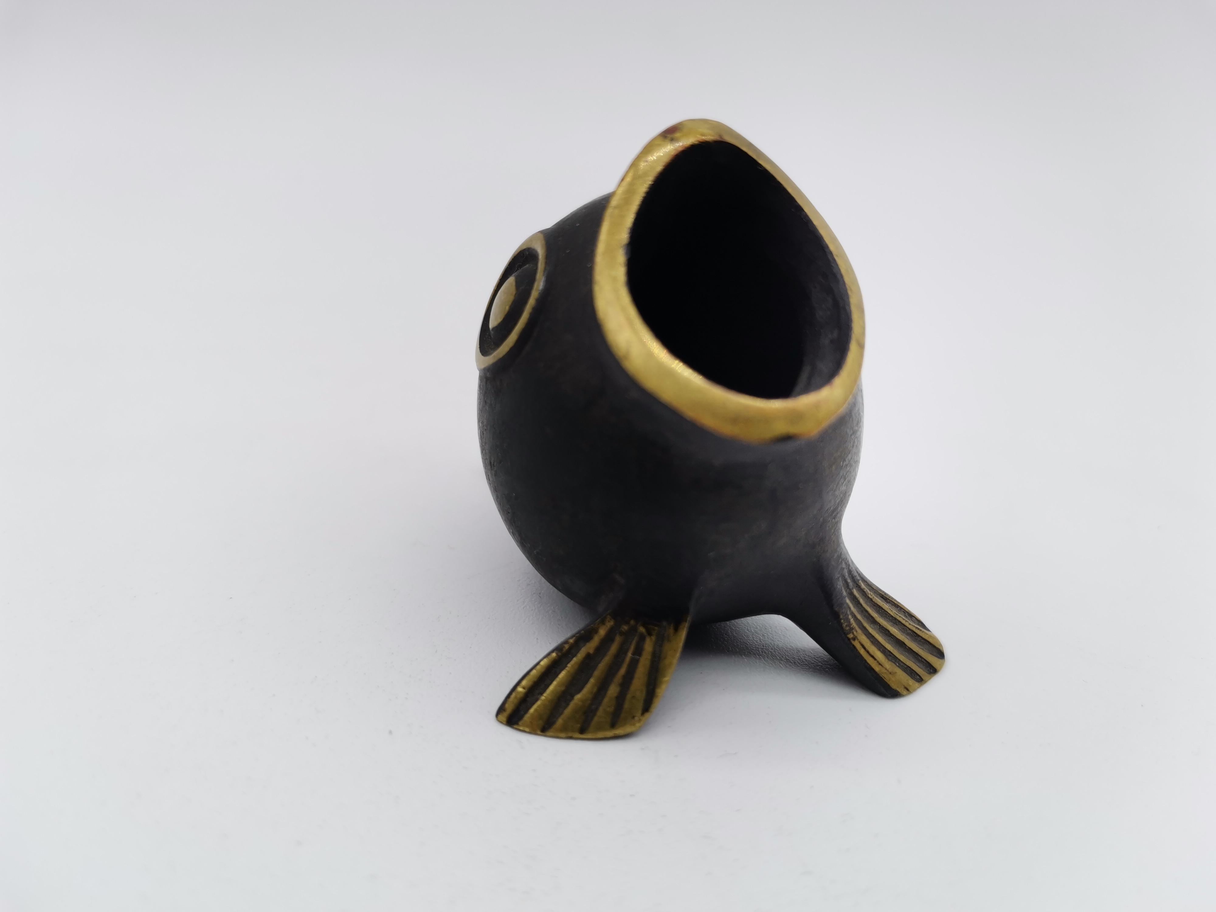 A small tooth pick holder in shape of a fish by Richard Rohac.