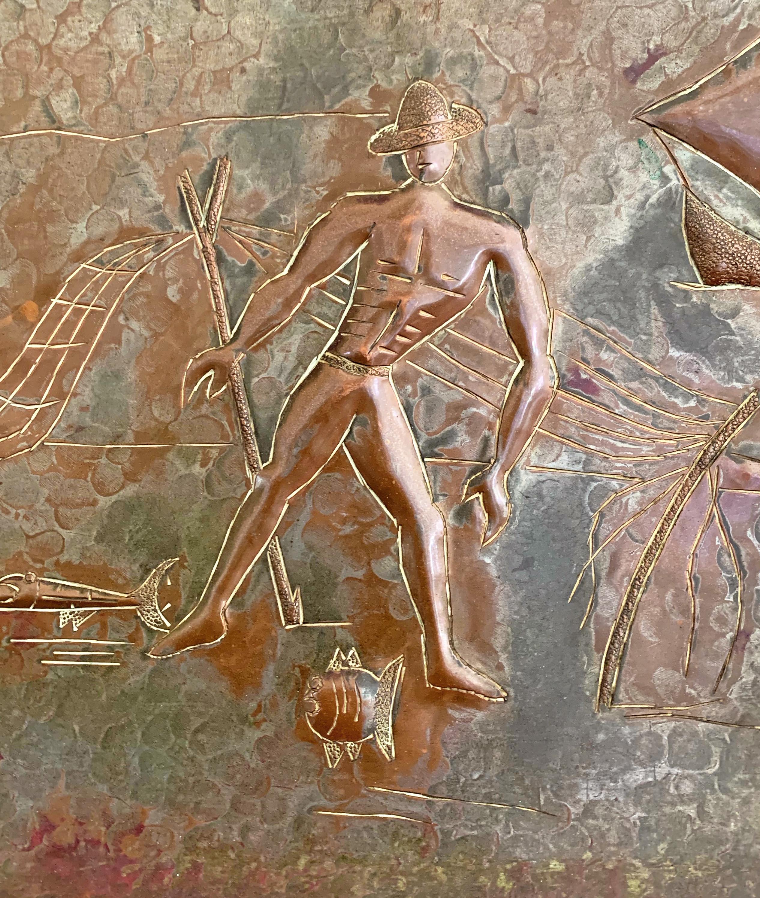 This rare and brilliantly-worked copper panel depicting a half-nude fisherman surrounded by a Middle Eastern townscape, exotic fish and a sailing boat, was created by A.N. Oppenheim, best known for producing high quality Judaica and enameled dishes