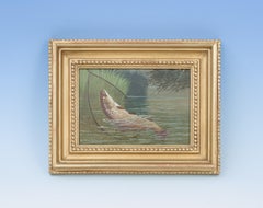 Fishing Oil On Board Of A Trout Being Landed