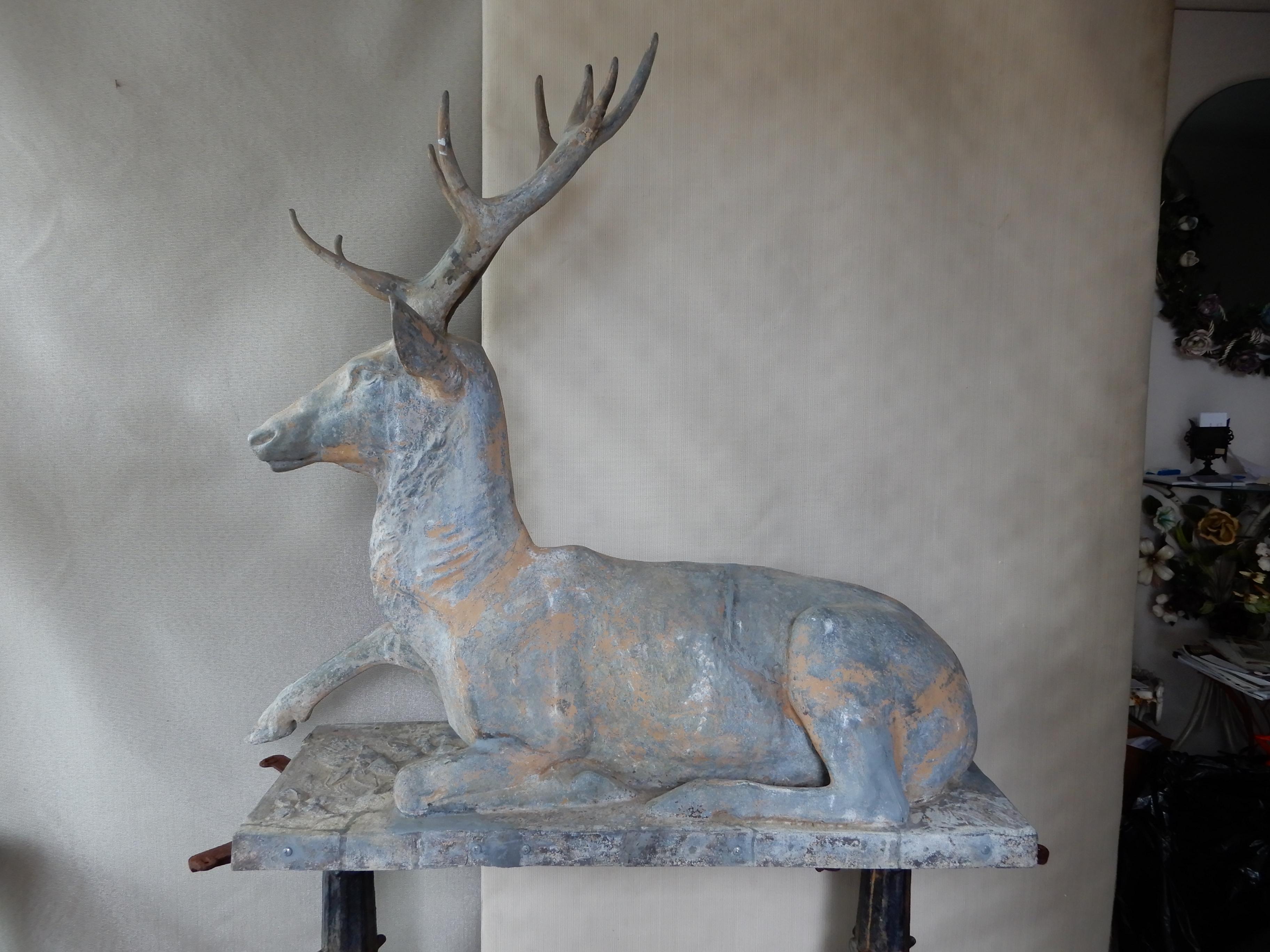 A signed Fiske reclining zinc deer. The recumbent deer with 1 leg tucked under its body First appeared in the 1874 Fiske Catalog. The info is from Carol Grissom’s book 
“Zinc Sculpture in America 1850-1950”. Sculptures of standing deer appear more
