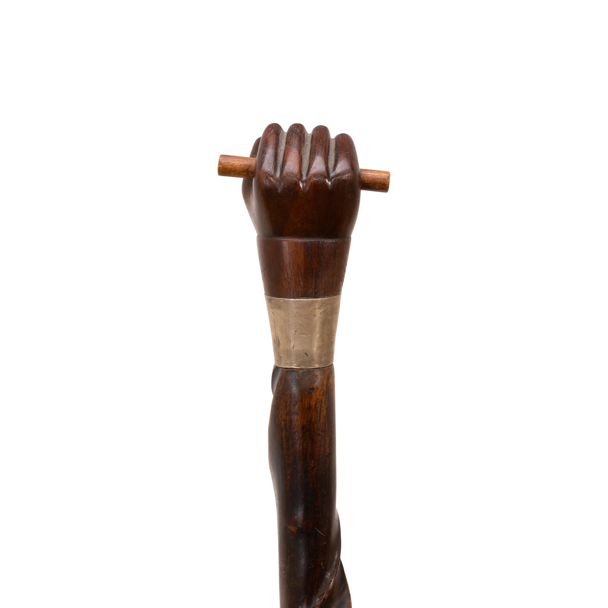 Circa 1880 fist corkscrew sword cane. Small antler handle, silver metal sealed eyelets, silver metal collar. Malacca shaft, push-pull mechanism exposed a triangular 28 1/2
