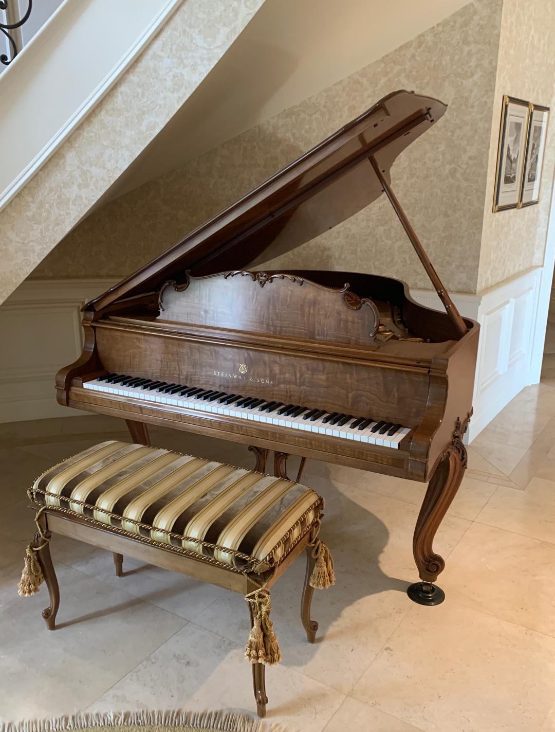 Steinway Louis XV Grand Piano in Beautiful Circassian Walnut - Retail over $130,000.00 new!  

The opulence of 18th century France is reproduced in this finely handmade and hand carved Steinway Model M grand piano made of beautiful grained