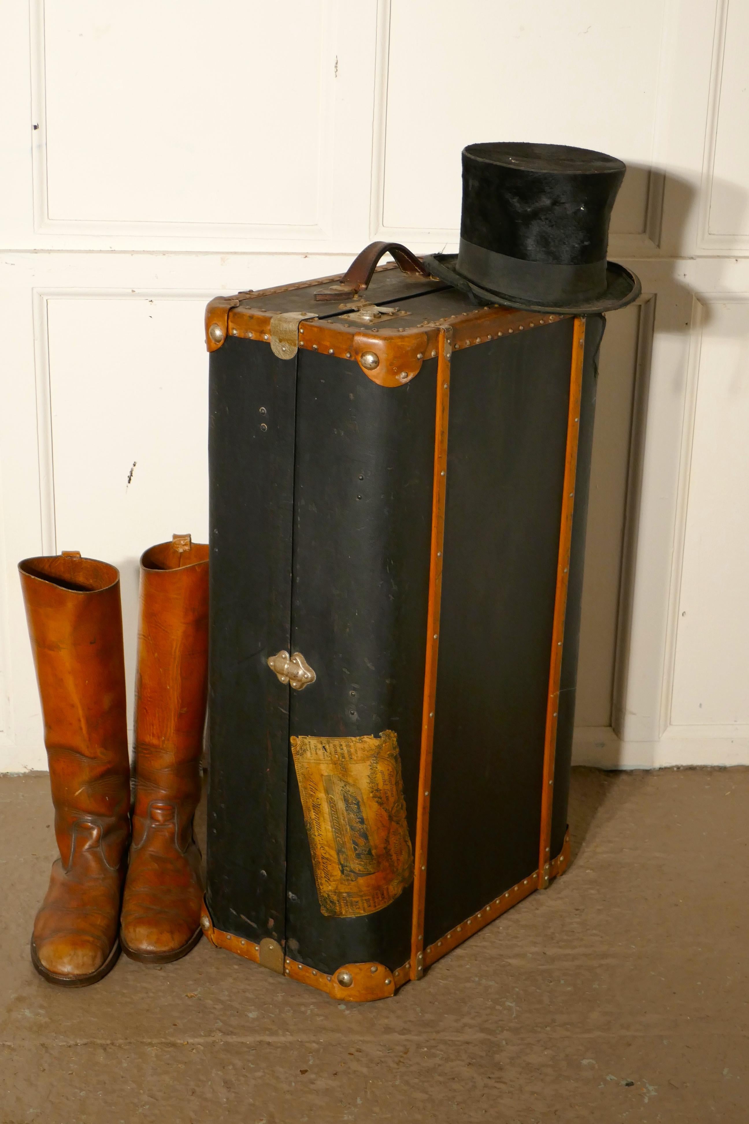  Fitted Steamer Trunk Cabin Wardrobe, 

A Superb piece of history dating back to the time when your luggage would be taken to your cabin. 
This is a small overnight version, it is in Black Canvas and bound in wood and leather, it is metal bound and