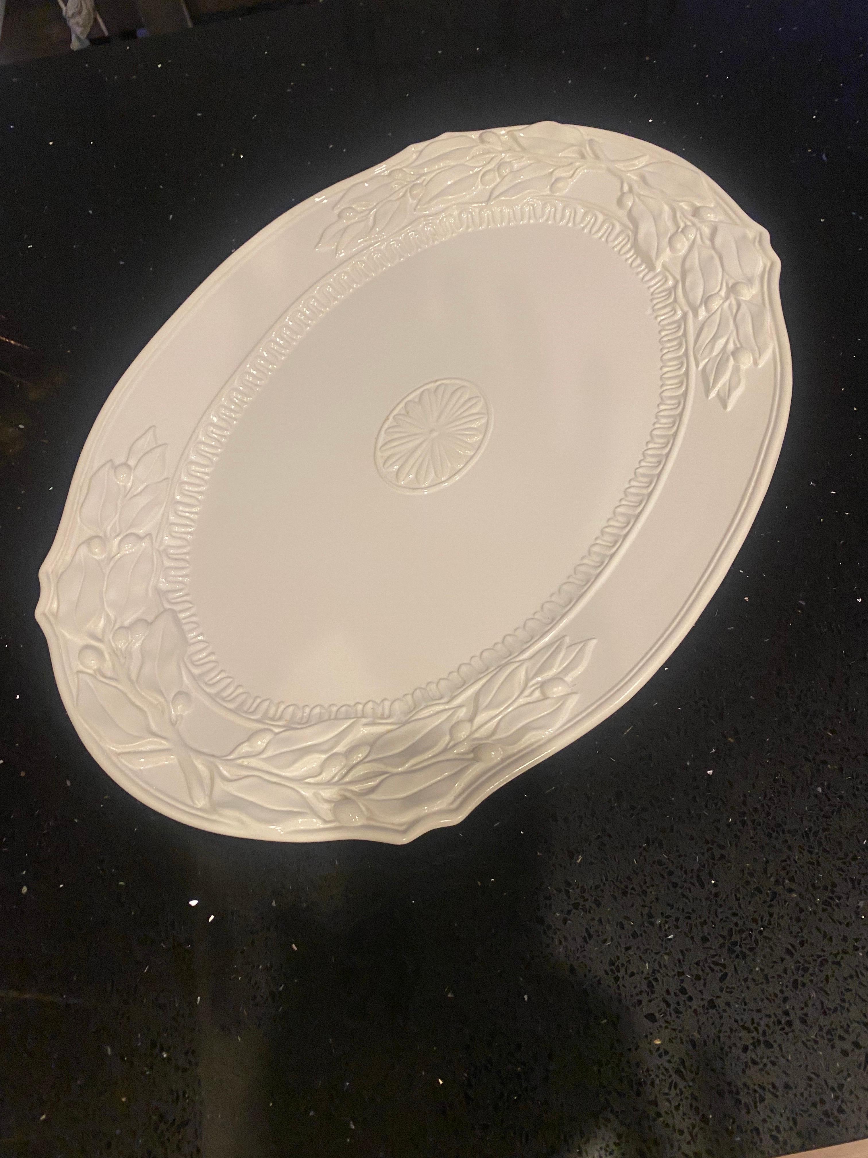 Fitz and Floyd Chateau Blanc Serving Platter.  Beautiful and sculptural, this piece exudes elegance. This piece adds classic French style to your entertaining. Beautiful details on this oversized Chateau Serving platter make it unique, elegant and
