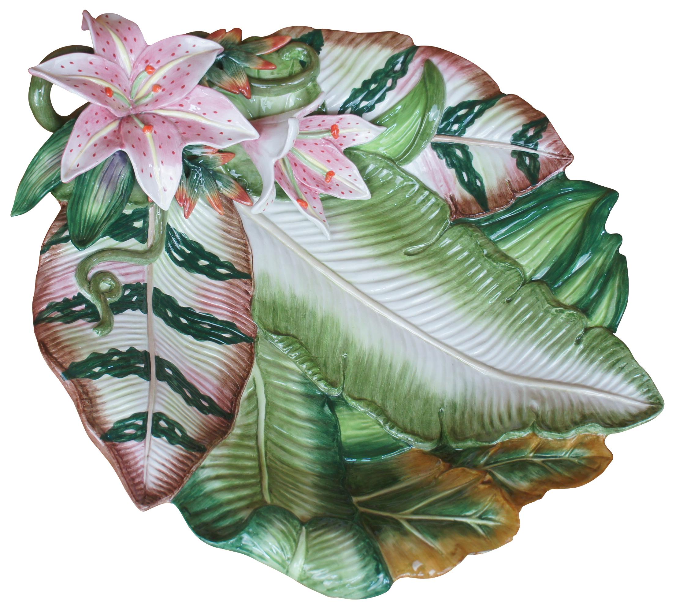 Fitz and Floyd Exotic Jungle Pink Lily ceramic platter decorated with bright and colorful Pink Lily flowers in high relief with round form. Measure: 18