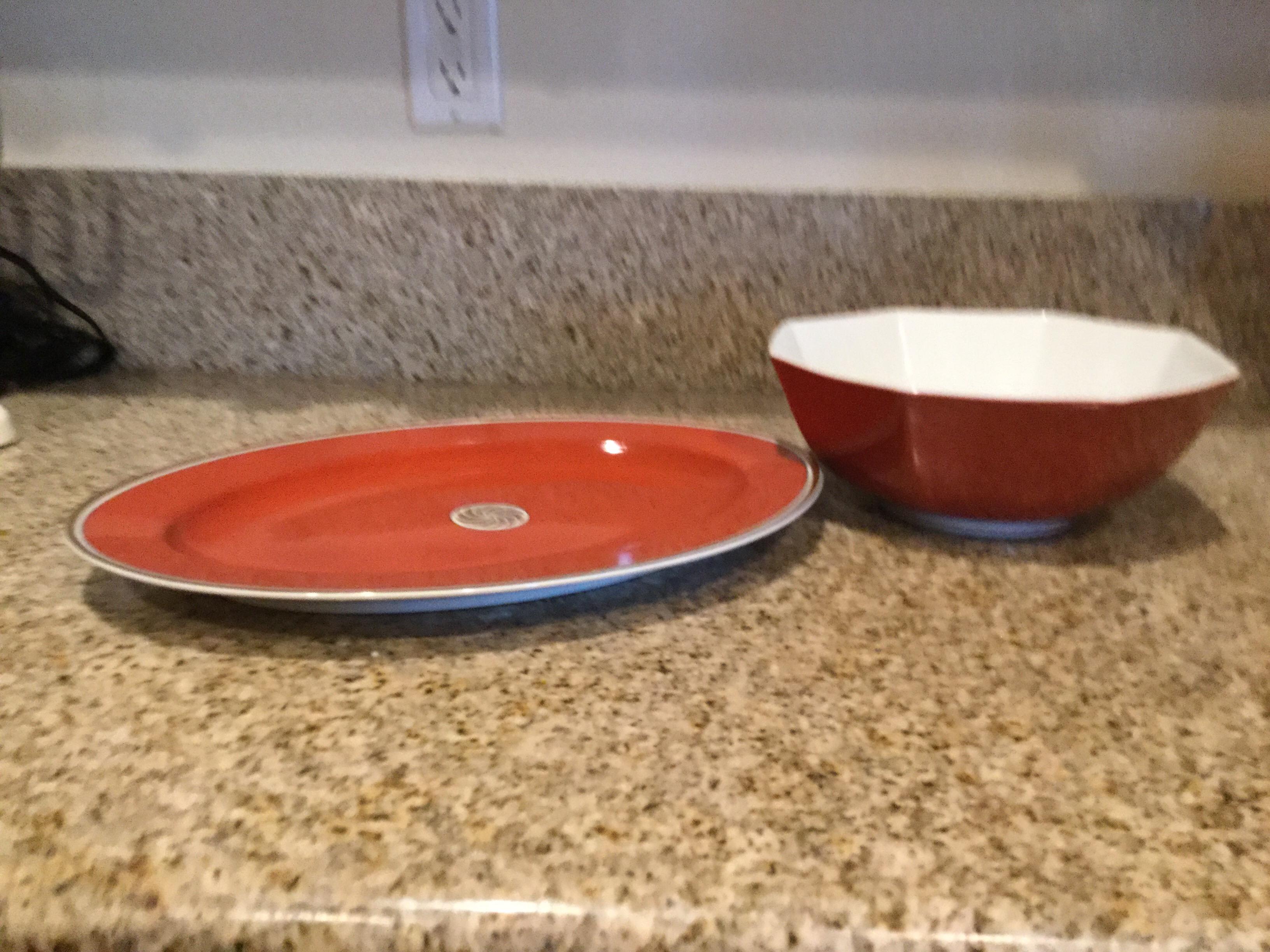 Large serving platter and large serving bowl. This is part of a huge set recently acquired from a multi million dollar Palm Springs estate. Purchased in 1979 this Medallion d’Or pattern is considered one of Fitz and Floyd’s most chic and highly