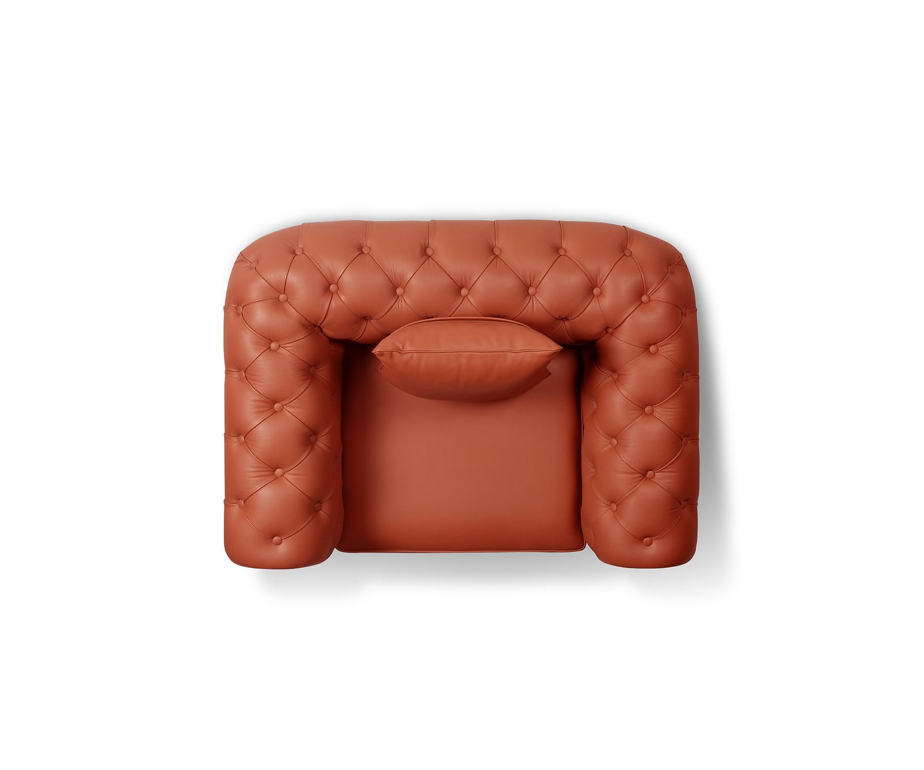 Timeless heritage, reimagined.⁠ Madheke’s chesterfield silhouette evokes a quiet grandeur—with a deep tufted back, fan trapunto detailing on scroll arms, and brass-finished feet resting on a walnut plinth. ⁠
Hand-finished, every element reflects a