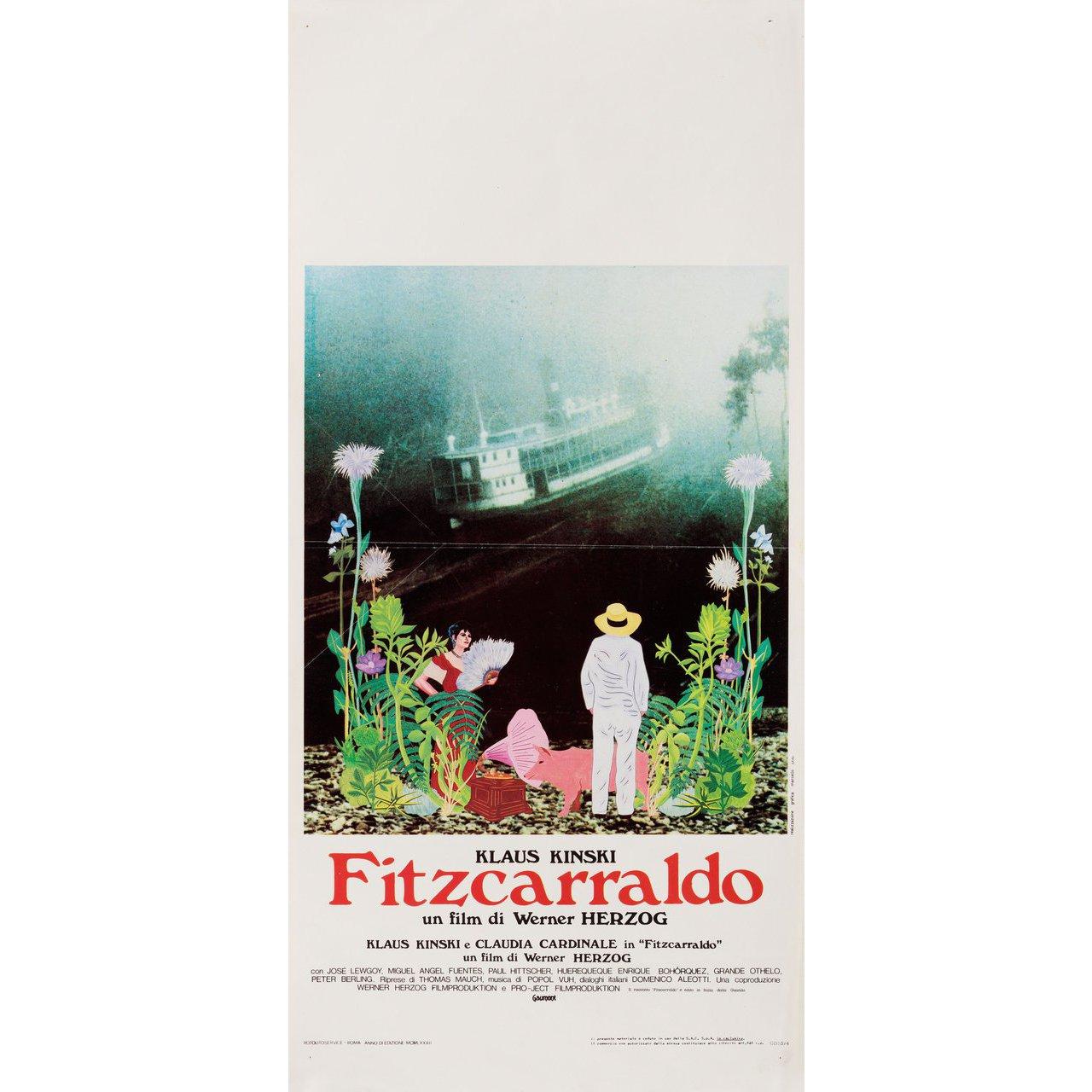 Original 1982 Italian locandina poster by Marcello Crisi for the film Fitzcarraldo directed by Werner Herzog with Klaus Kinski / Claudia Cardinale / Jose Lewgoy / Miguel Angel Fuentes. Very good-fine condition, folded with pinholes. Many original