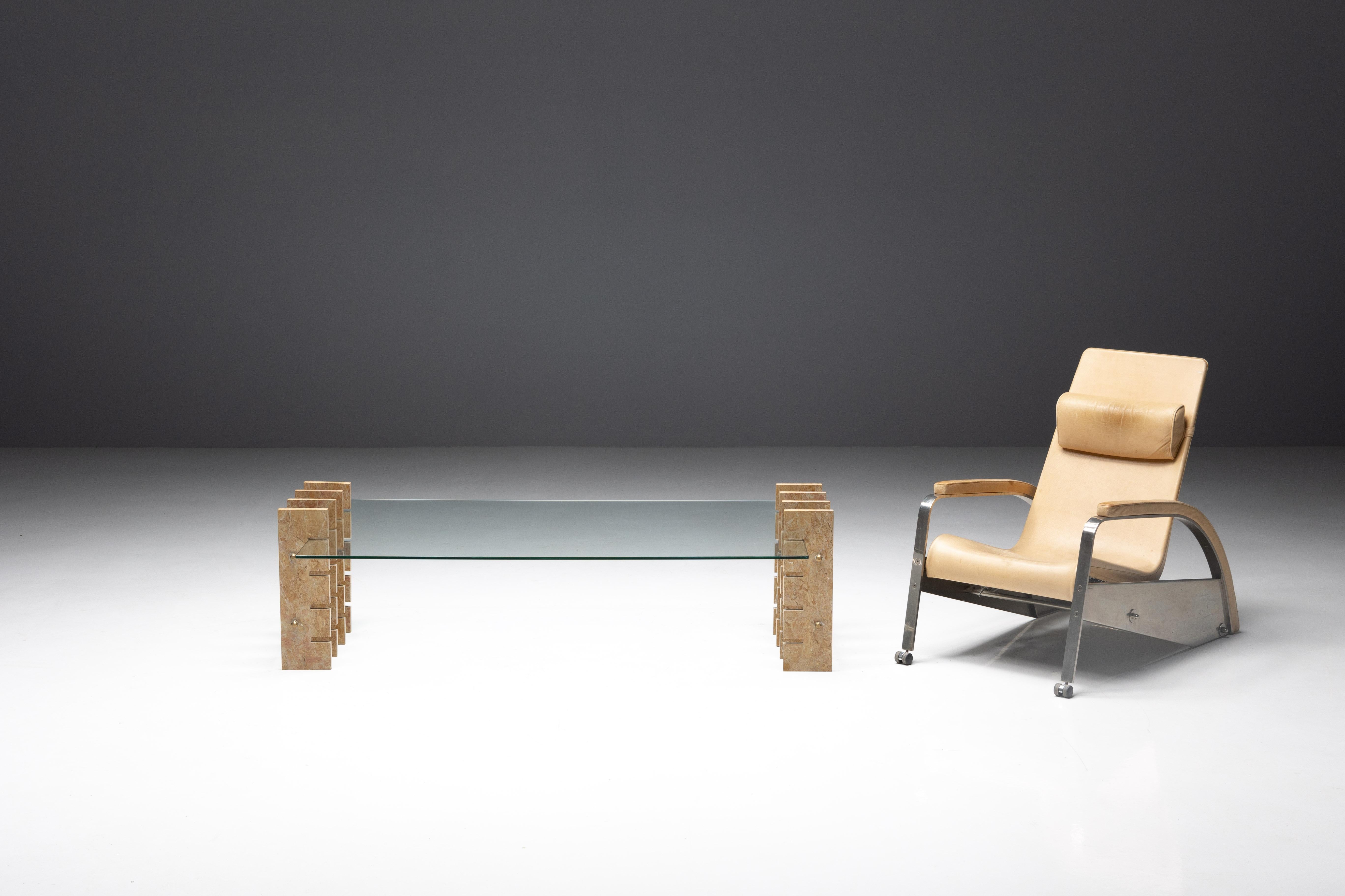 Fitzroy marble coffee table by Gianfranco Ferré, inspired by the sleek aesthetics of the 1970s and reminiscent of mechanical devices. This coffee table boasts a robust structure made of marble and structural bars. It features a coupled clear glass