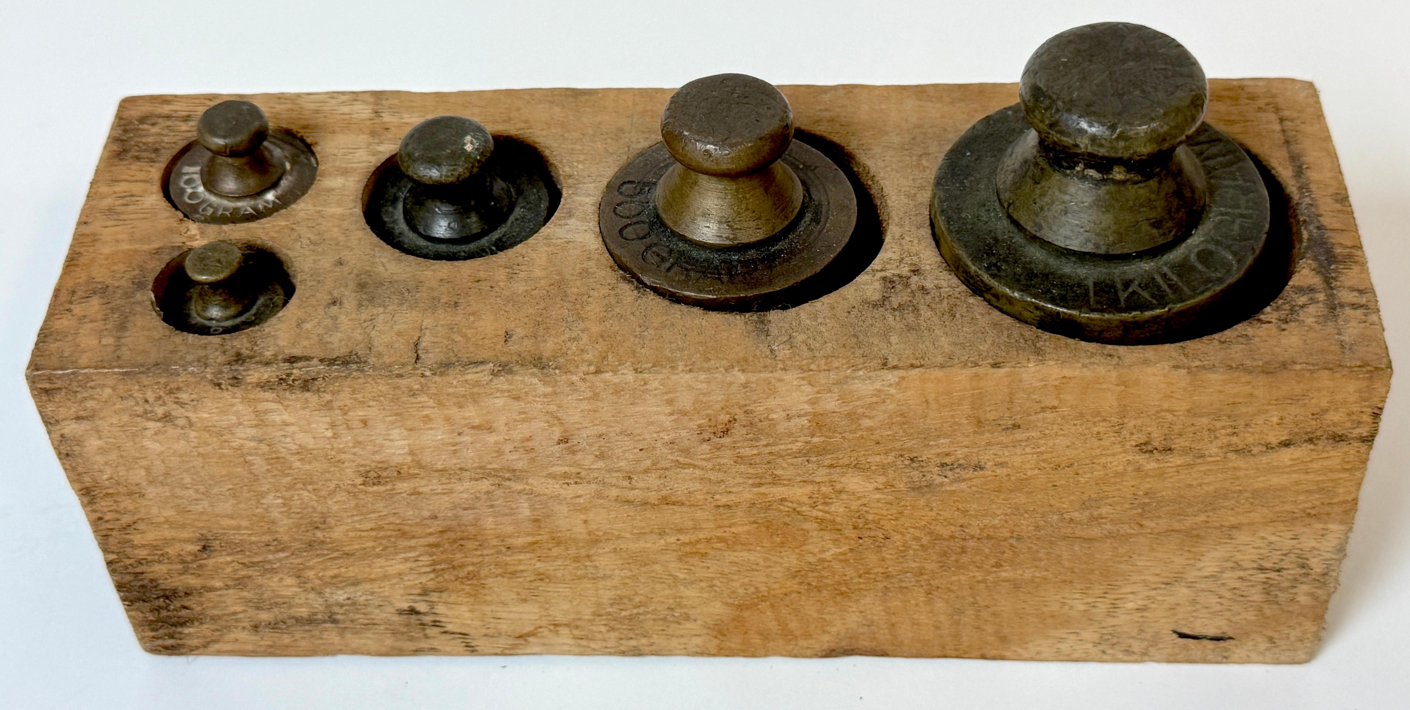 Français Five 19th C. French Bronze Metric (Apothecary ) Weights, Original Wooden Block en vente