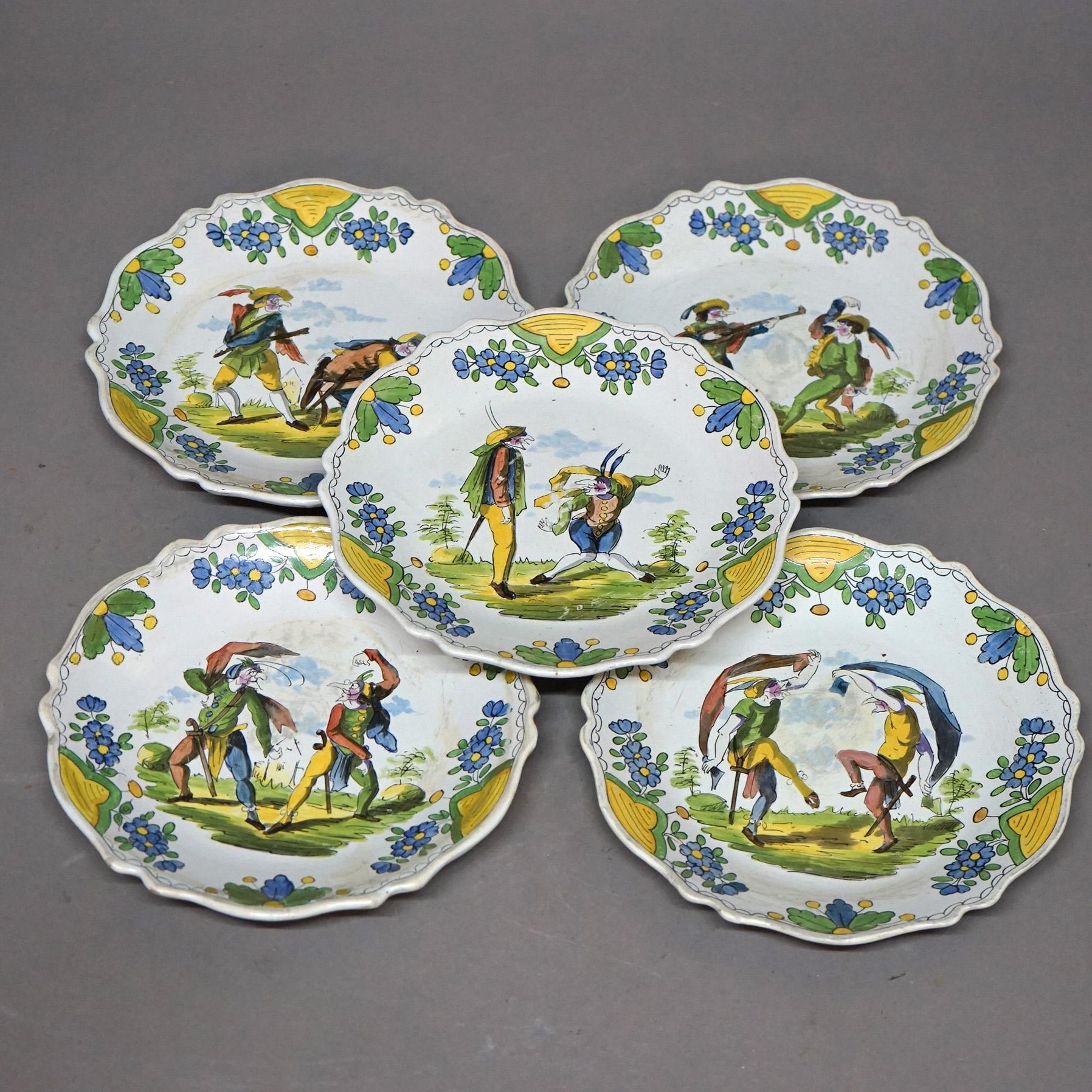 A set of five antique French character plates by Les Islettes offer hand painted Faience soft paste pottery construction with figures, late 18th century

Measures- 1''H x 9.75''W x 9.75''D