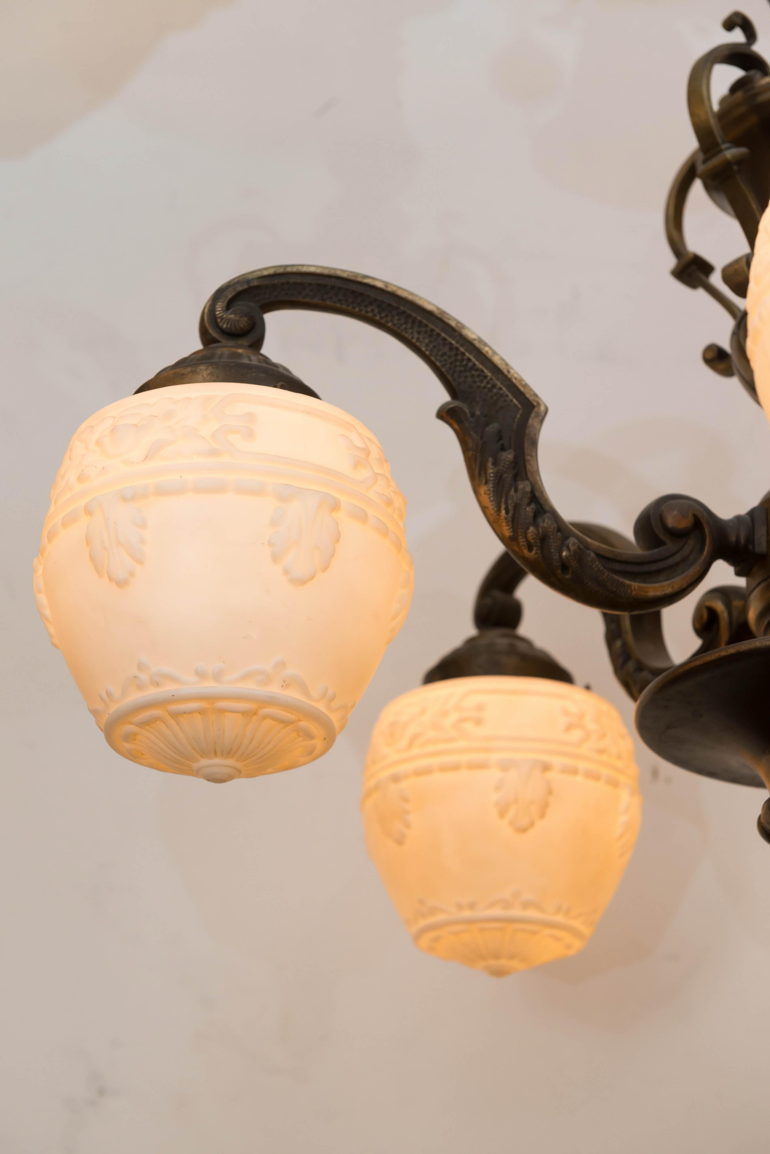 American Five-Arm Bronze Edwardian Chandelier, White Embossed Acorn Style Glass Shades