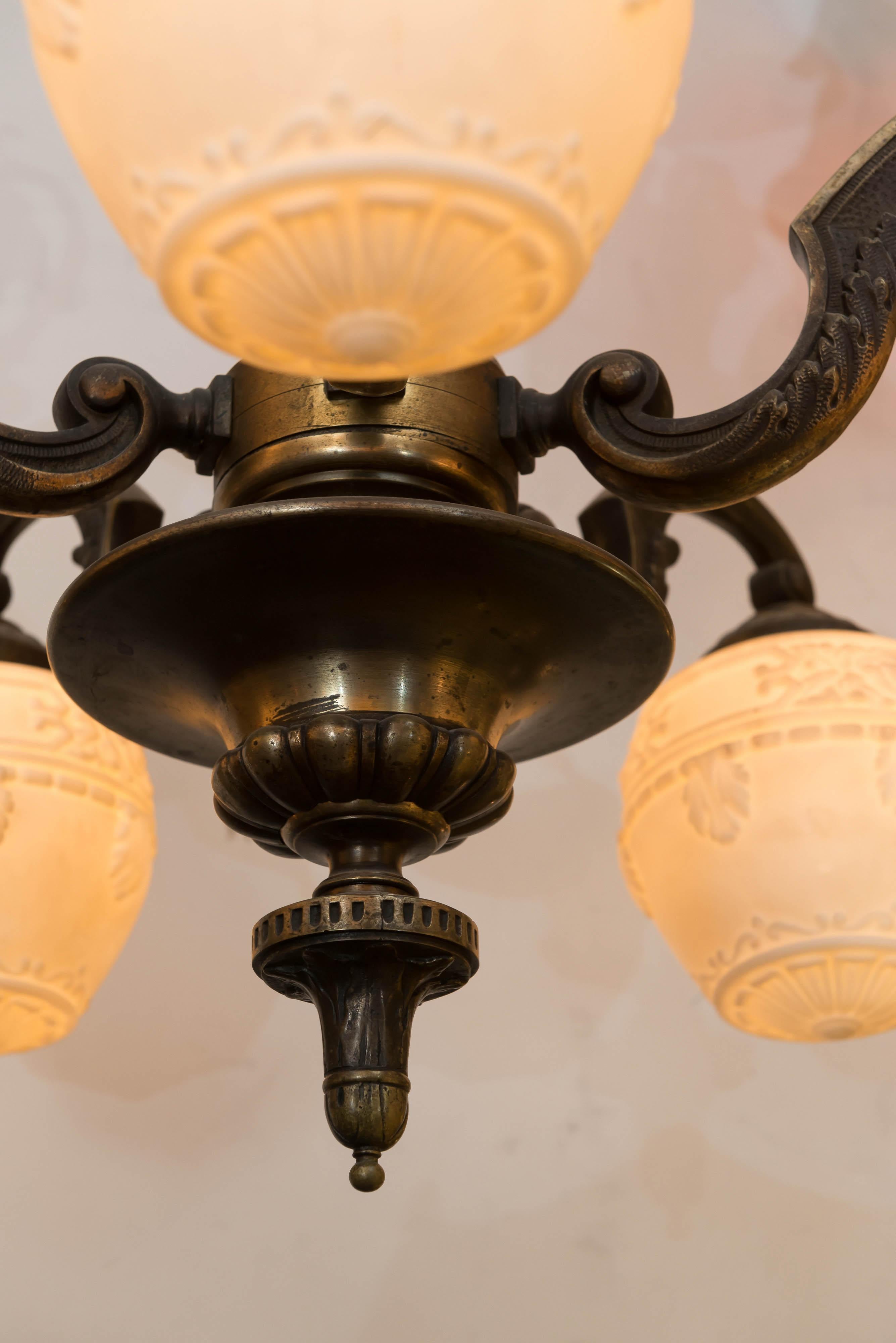 Five-Arm Bronze Edwardian Chandelier, White Embossed Acorn Style Glass Shades In Excellent Condition In Petaluma, CA