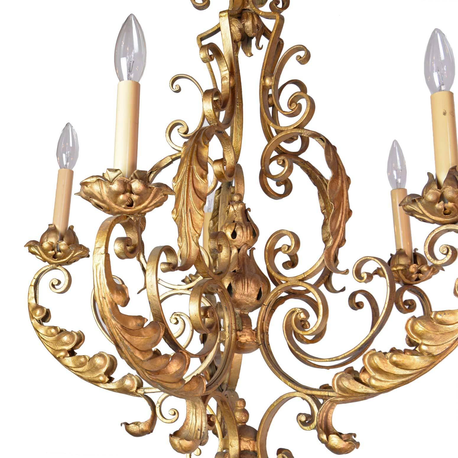 Ornate five-light painted iron chandelier featuring scroll and acanthus leaf detail. Elegant, opulent, and très chic! 

Measures: 31