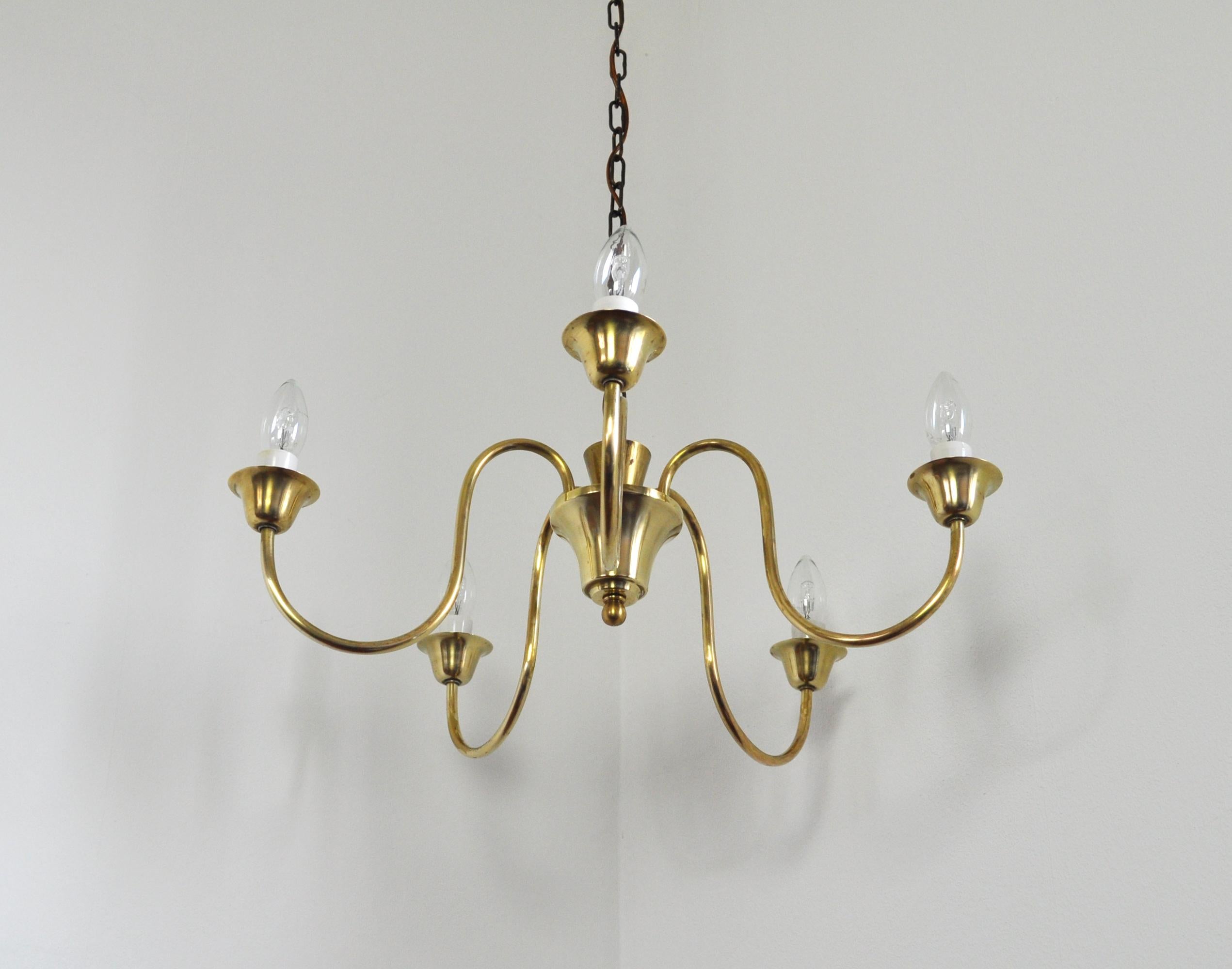 Solid brass five-arm chandelier by Fog & Mørup, Denmark, 1950s.

Dimensions: Height 19 cm, diameter 55 cm.
Full length with chain 133 cm.