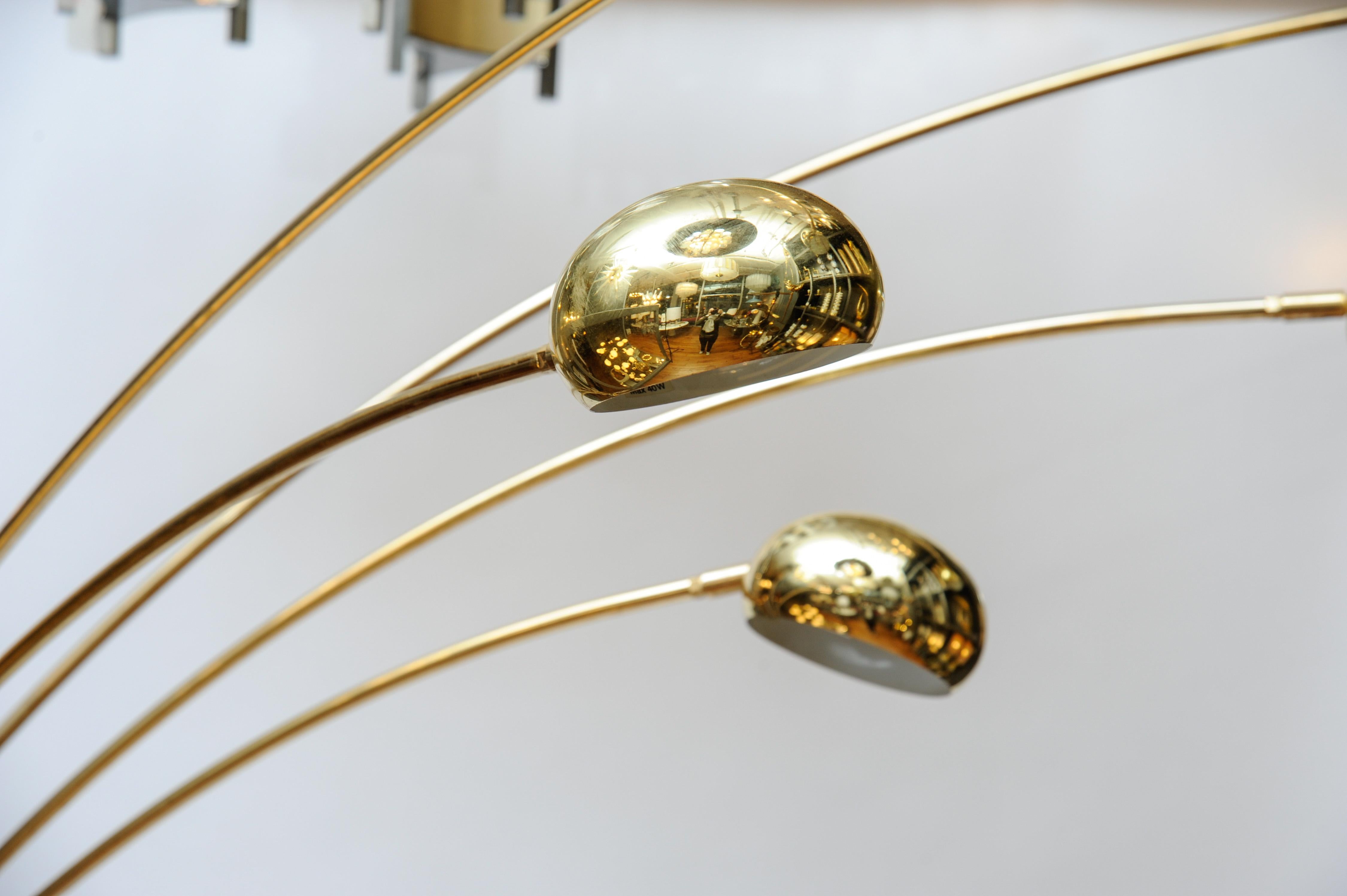 Arc floor lamp from Sweden made of a round marble foot, brass central stem and five arms of light.