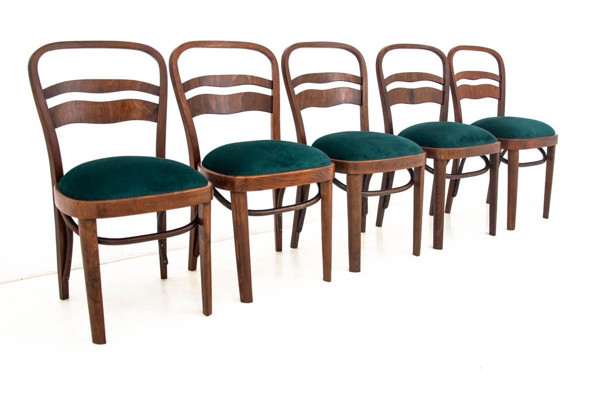 A set of chairs, Poland, 1940s-1950s

Very good condition. After renovation of the wood and replacement of the upholstery with a new one.

Dimensions: Height 85 cm, seat height 43 cm, width 45 cm, depth 51 cm.