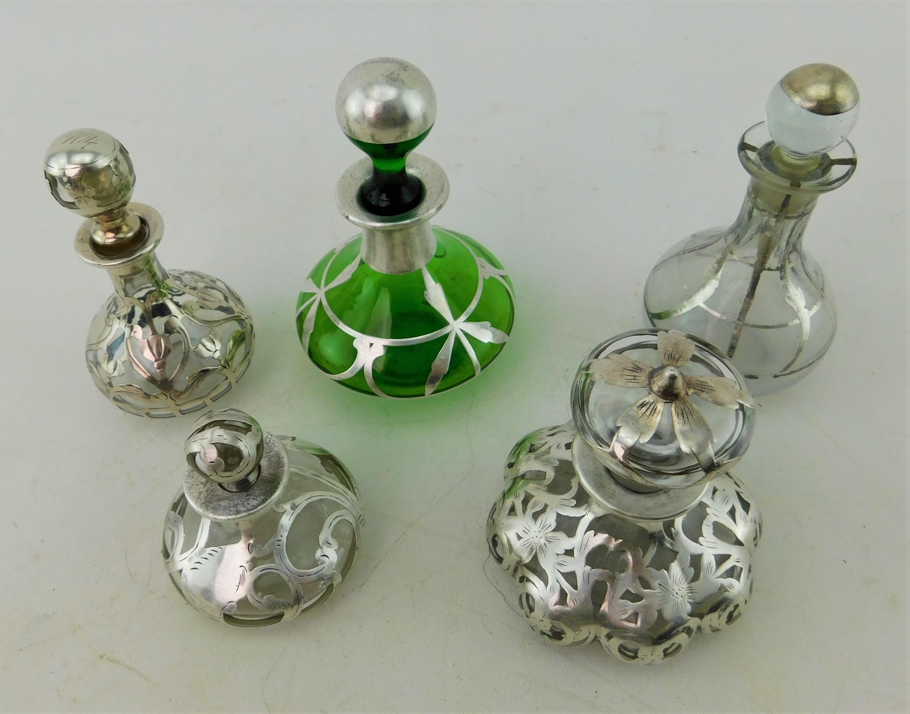 Five Art Nouveau Perfume Bottles circa 1900 Silver Overlay on Glass 19th Century In Good Condition For Sale In Hamilton, Ontario