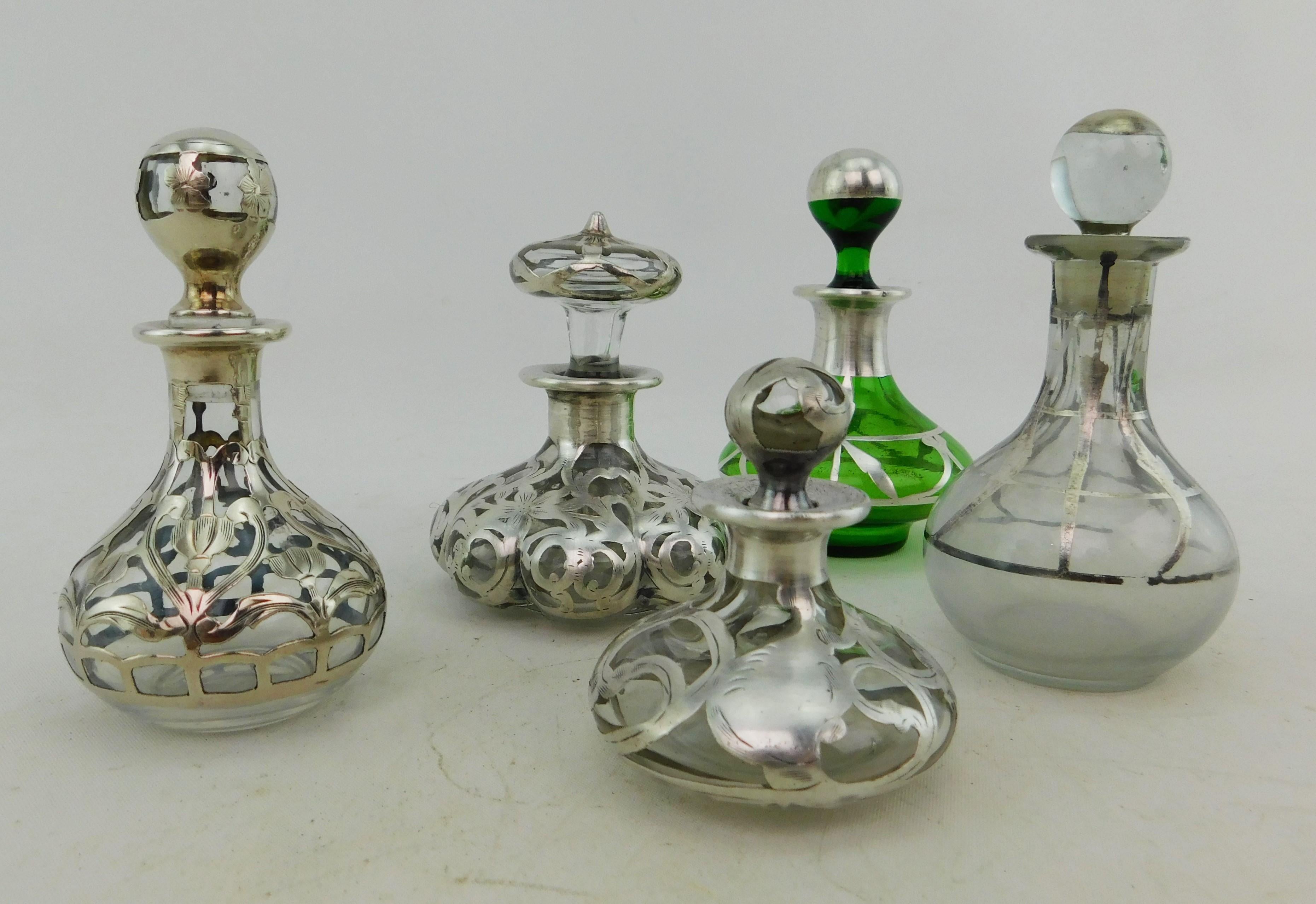 Five Art Nouveau Perfume Bottles circa 1900 Silver Overlay on Glass 19th Century For Sale 1