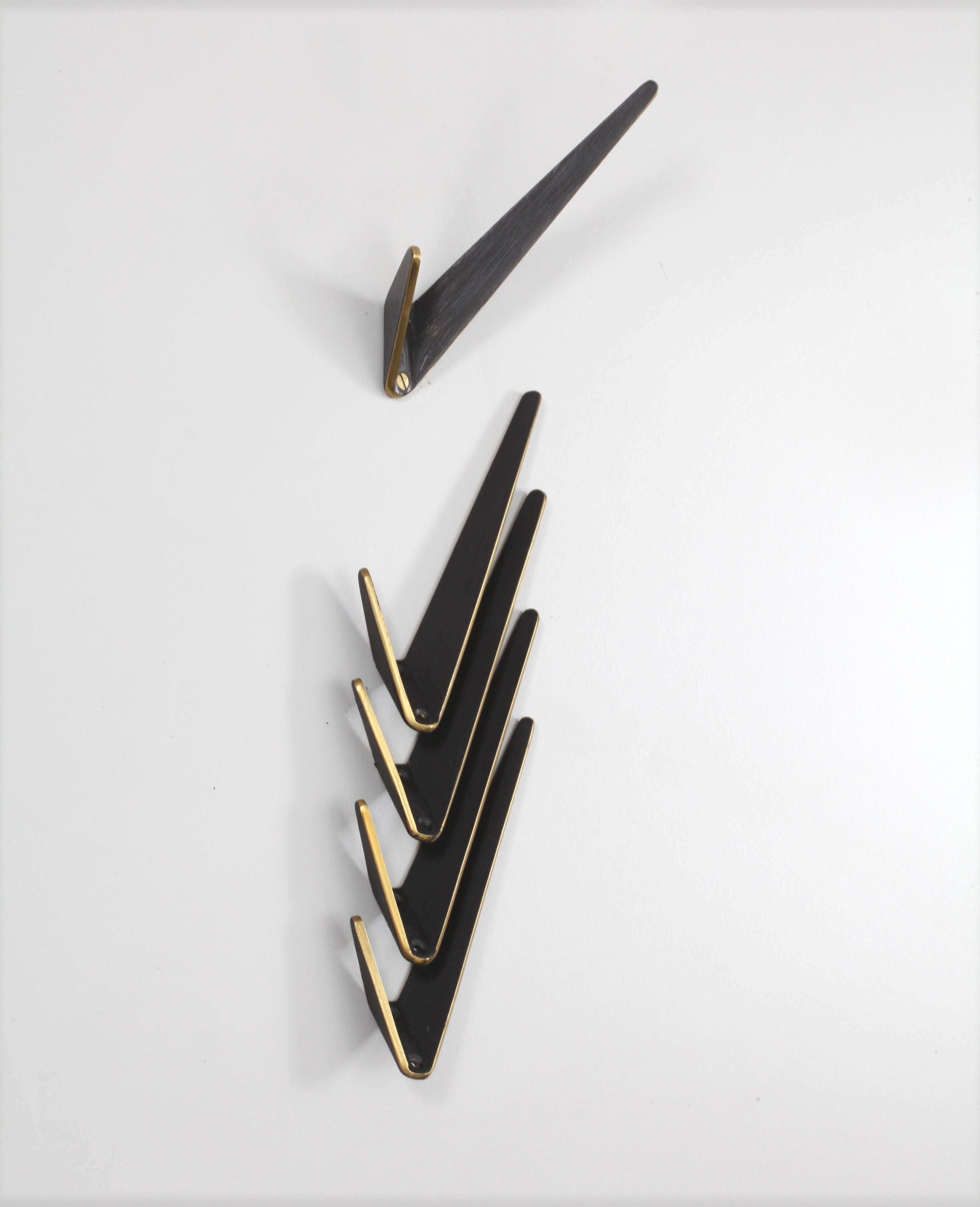 Five asymmetric modernist brass wall hooks by Hertha Baller,
Vienna, 1950.