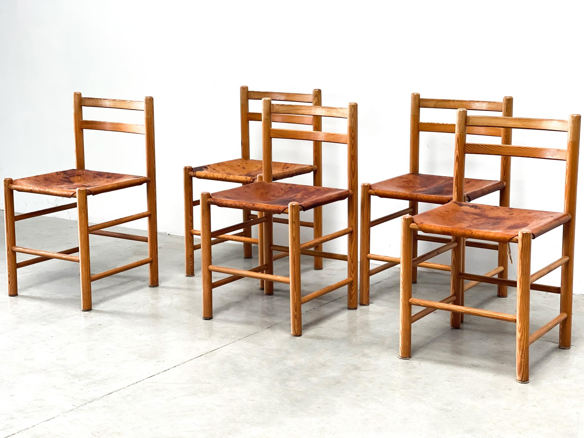 Mid-20th Century Five Ate van Apeldoorn patinated leather dining chairs
