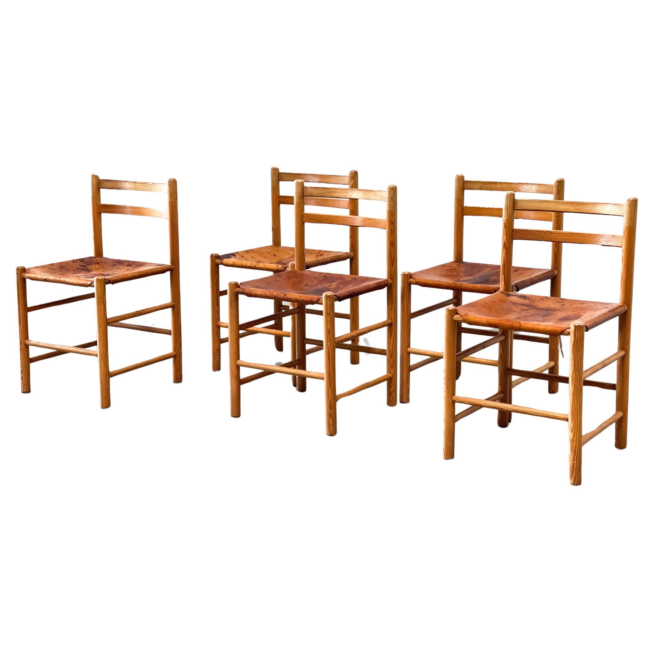Five Ate van Apeldoorn patinated leather dining chairs