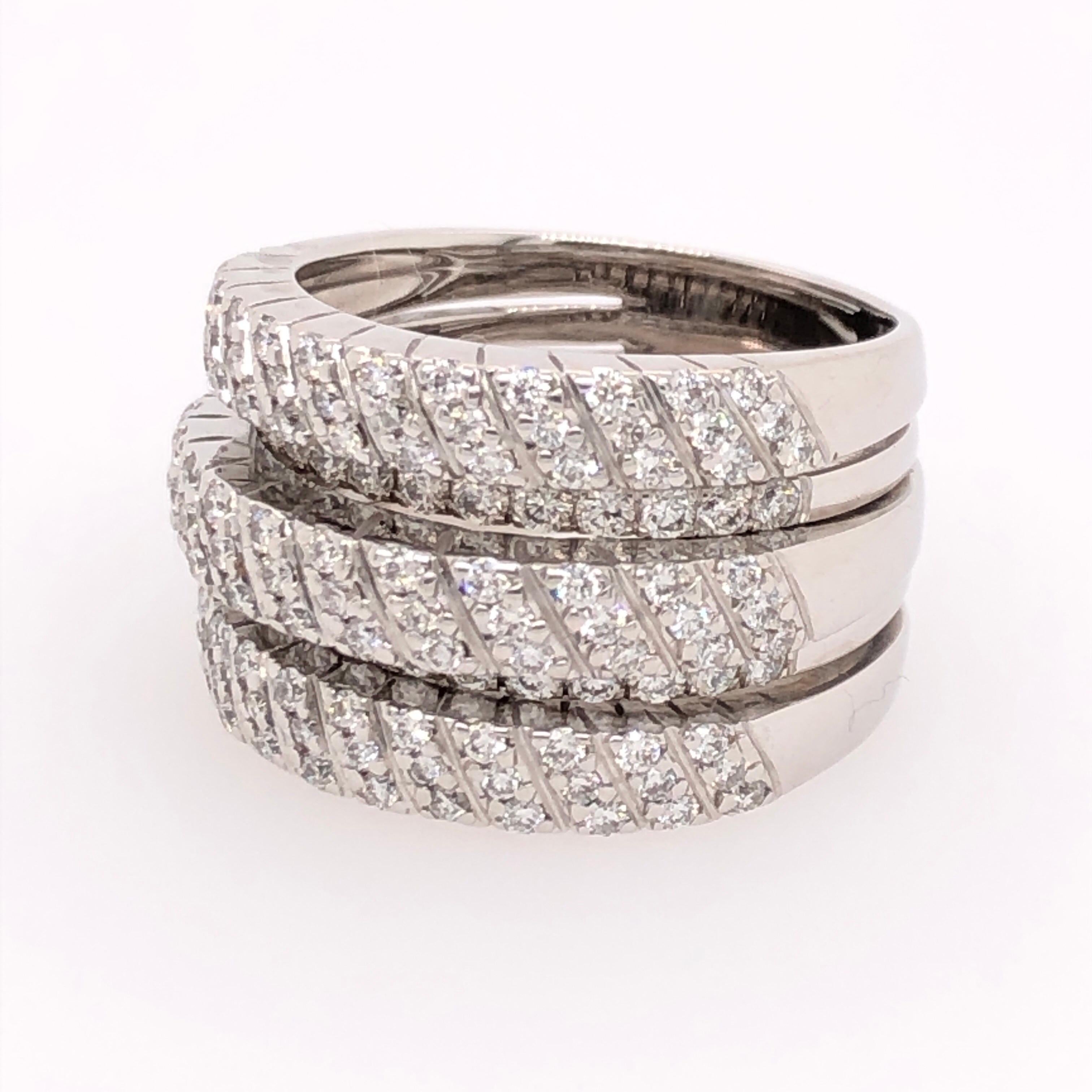 If your looking for a show stopping piece this is it. Our 18 karat white gold five band 1.6CT of pave diamonds ring is sure to turn heads!

Size: 7.5