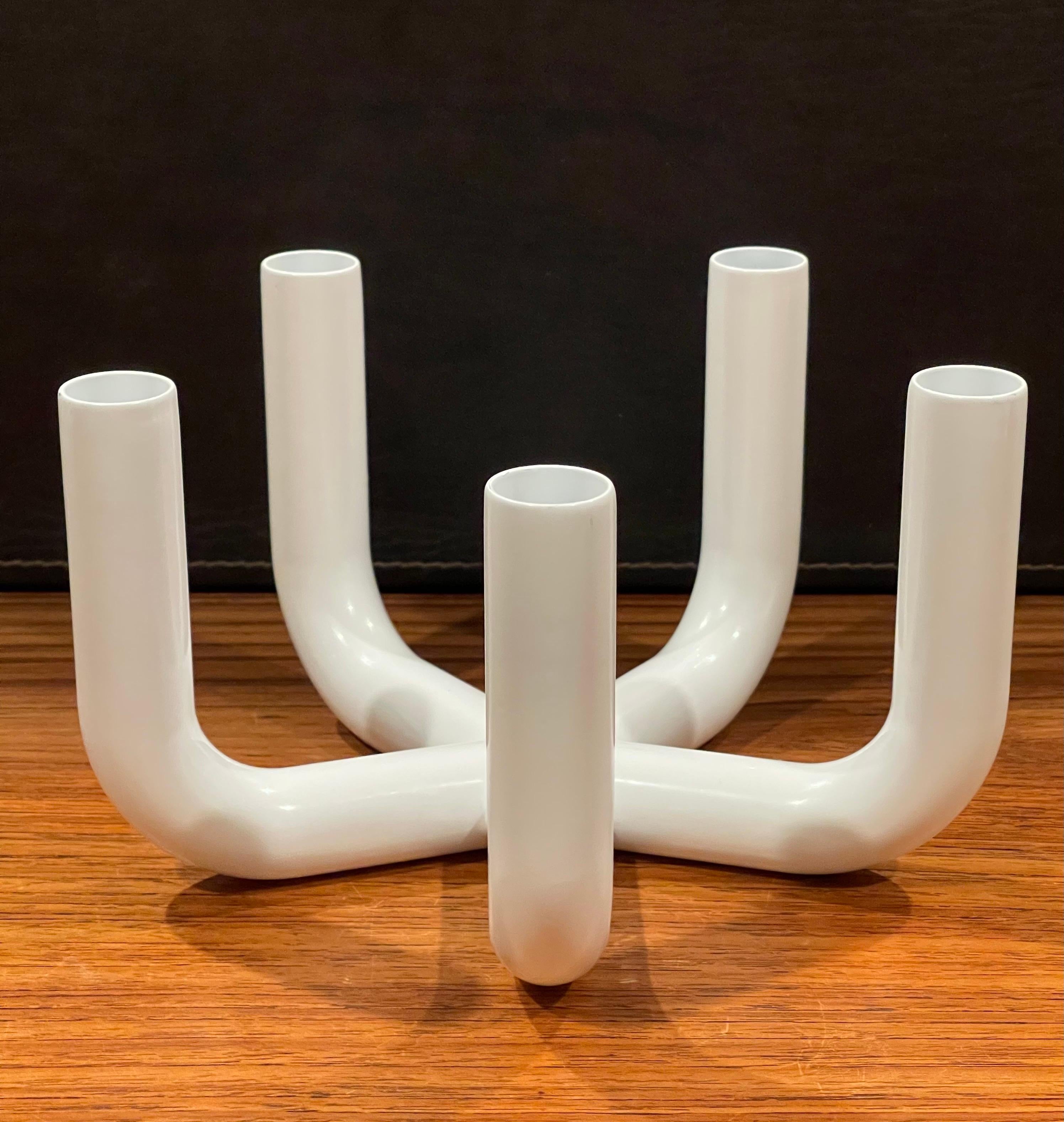 Solid five candle holder in white enamel by Conrian Design, 1980s. The piece has a nice post modern look with 3/4