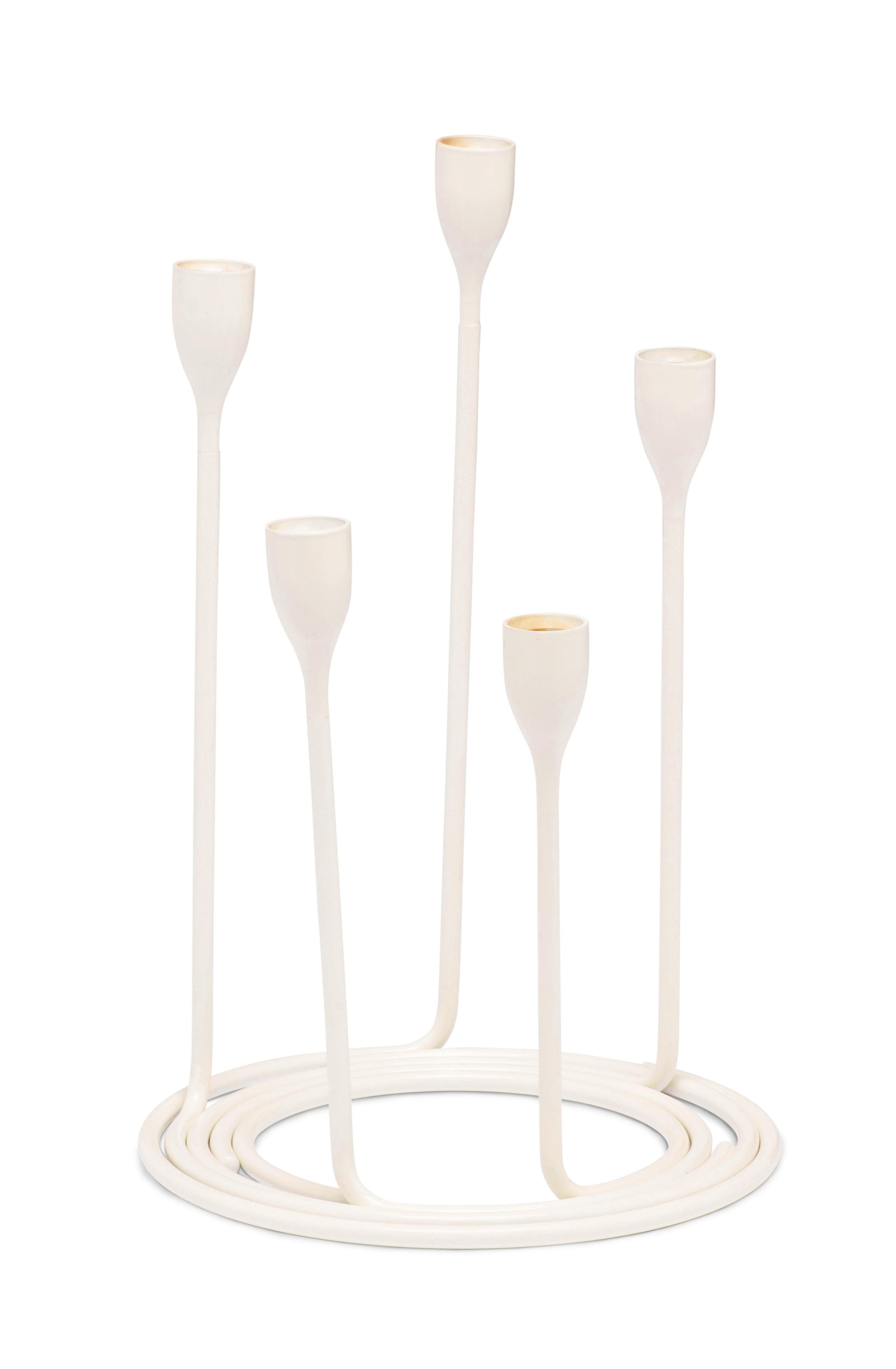 A beautiful set of five candleholders that can be assembled altogether or presented individually. 

Please contact us for more information and for alternative shipping quotes. 