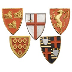 Five Carved Armorial Plaques