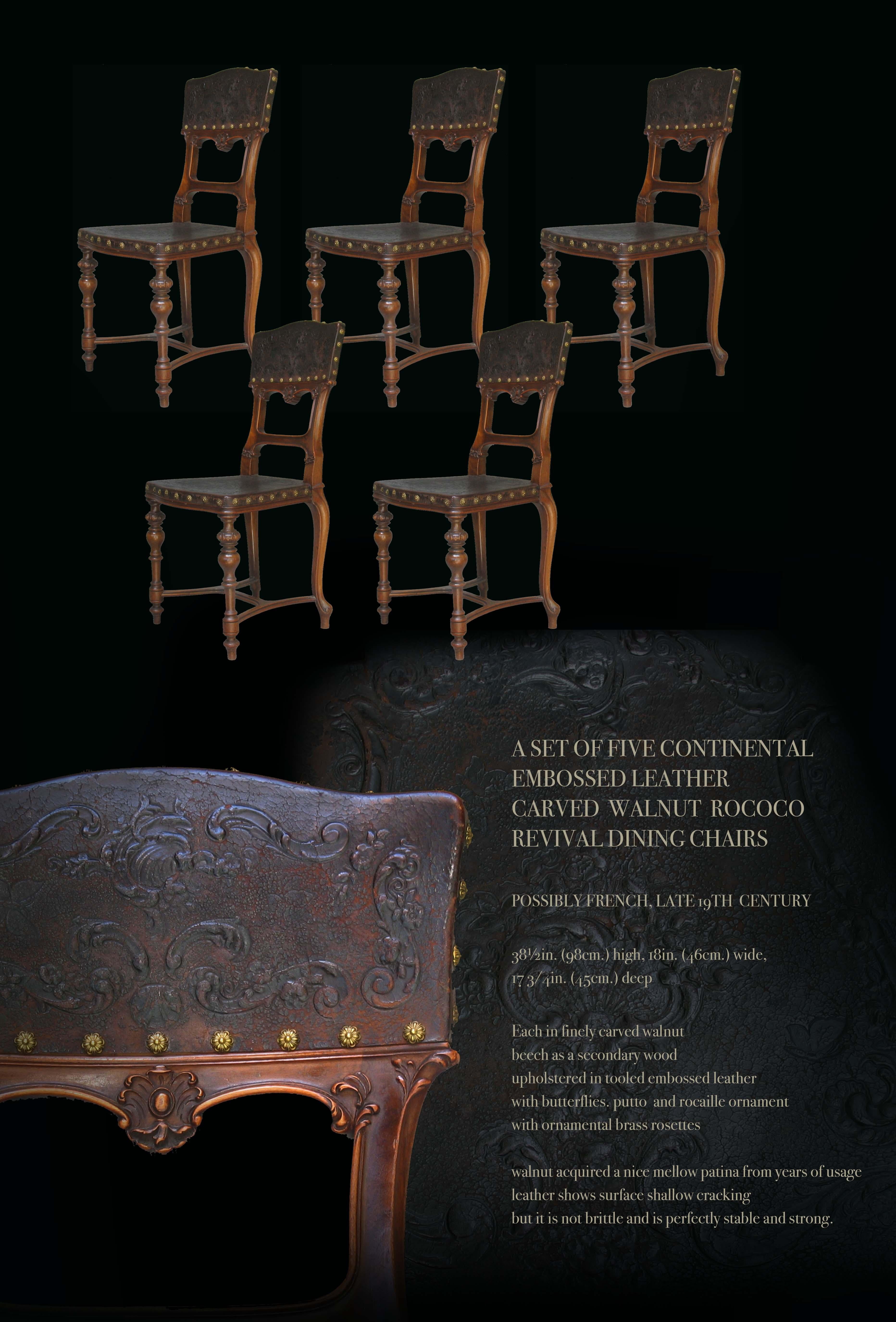 A SET OF FIVE CONTINENTAL
EMBOSSED LEATHER
CARVED WALNUT ROCOCO
REVIVAL DINING CHAIRS

POSSIBLY FRENCH,  LATE 19TH CENTURY

38½