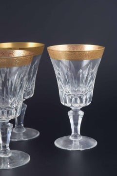 Five crystal glasses with gilt rim, mid-20th century.