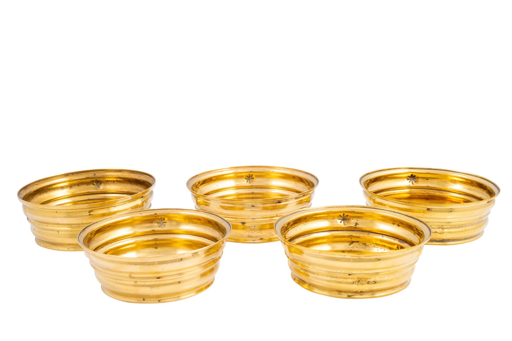 Five brass dishes designed by Dagobert Peche manufactured by Wiener Werkstatte Austrian Jugendstil ca. 1920 marked

As a founding member of the „Österreichischer Werkbund”, Dagobert Peche was introduced to the Wiener Werkstatte by Josef Hoffmann.