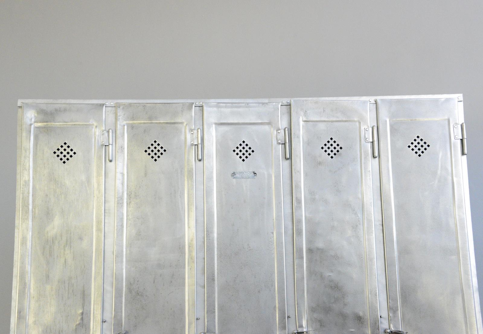 Five-door industrial lockers by Otto Kind, circa 1920s

- Made from sheet steel
- Diamond shaped vents
- 4 hanging hooks and 1 shelf in each compartment
- Made by Otto Kind
- German, 1920s
- measures: 151cm wide x 33cm deep x 175cm