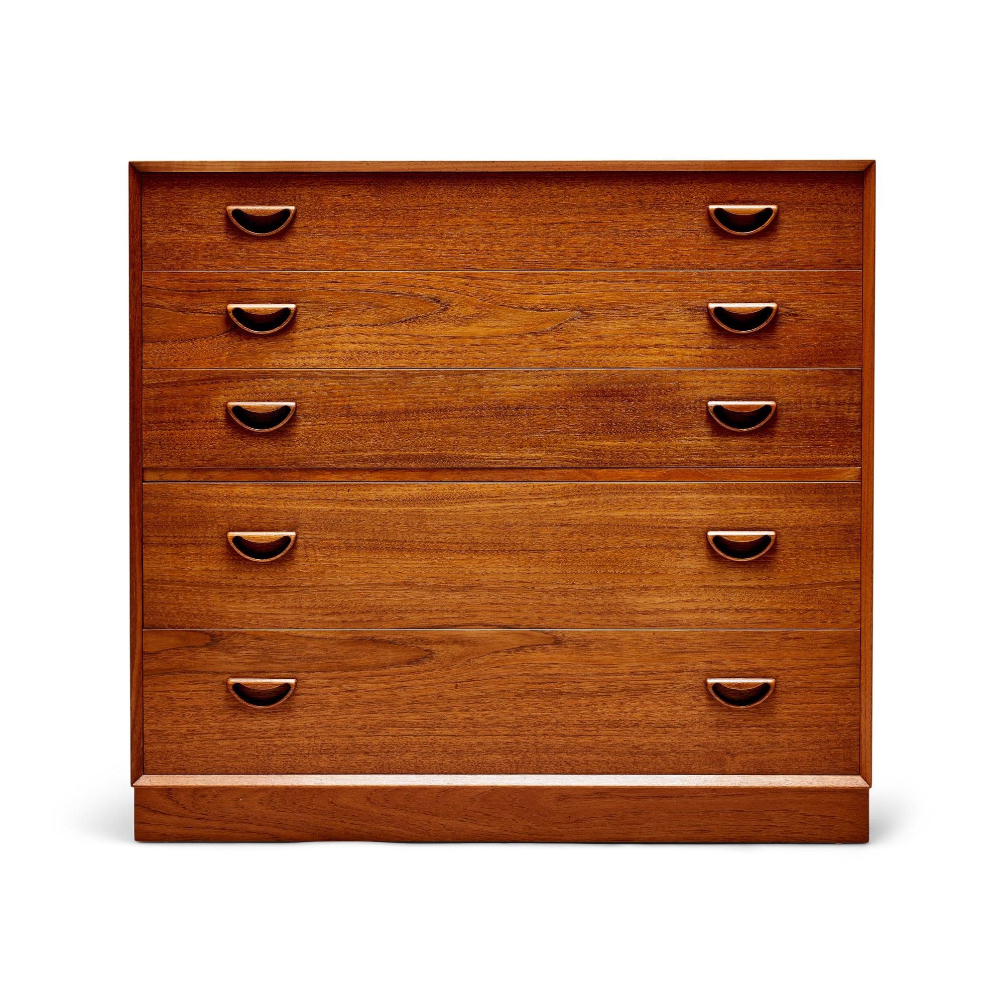 A modular five drawer cabinet made of solid Burmese teak with beveled edged and finger joint detail. ?30