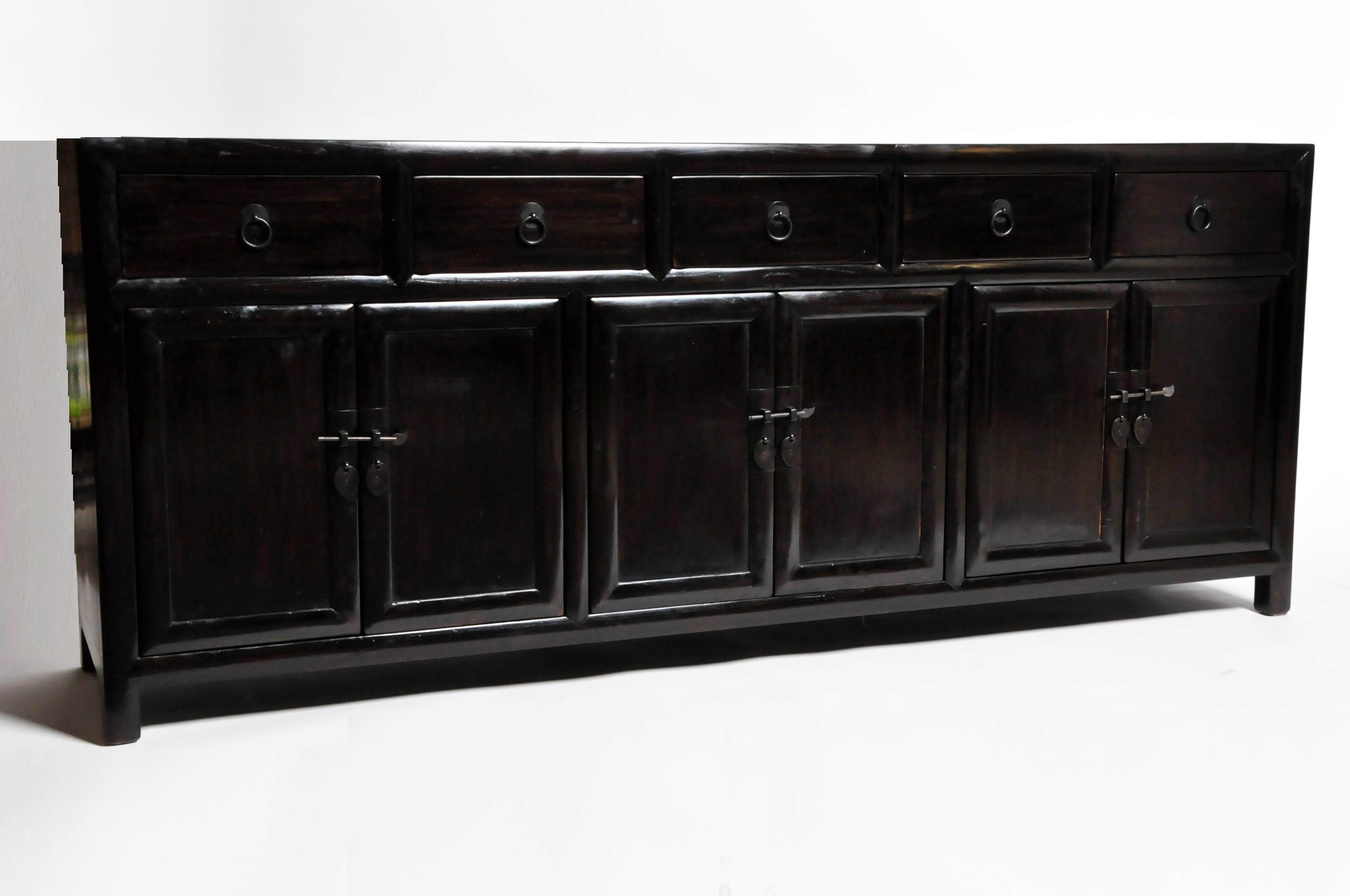 This five-drawer sideboard is from Hebei, China and was made from reclaimed elm wood, circa 1865. It features three shelves on the bottom and five drawers for ample storage. You can also customize it and make it your own. Wood, color, finish, and
