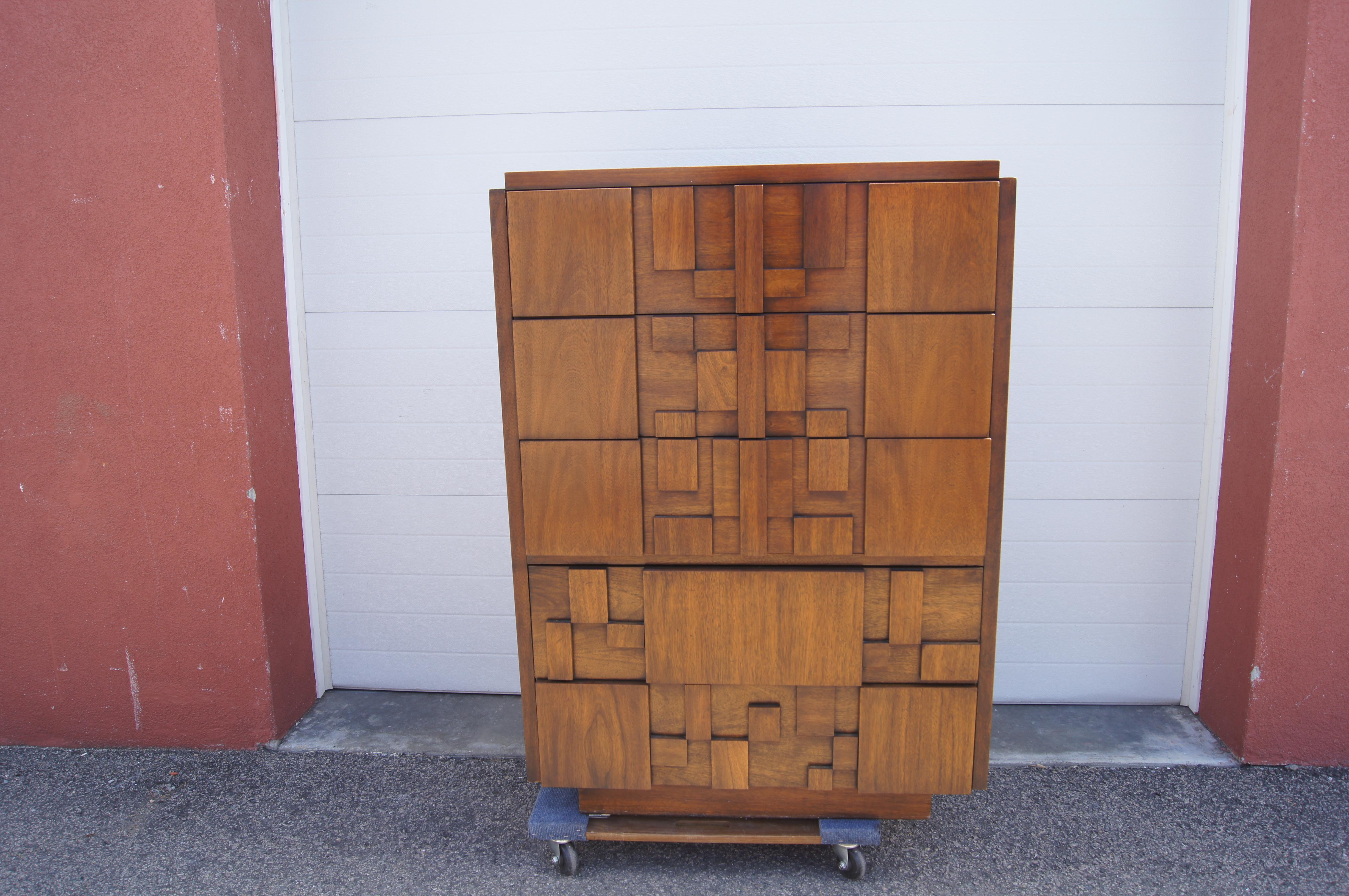 Created by Lane Furniture as part of their Mosaic Series, this dresser features a front arranged as a Brutalist composition of blocks. Five deep drawers provide ample storage. Maker's mark inside drawer.
