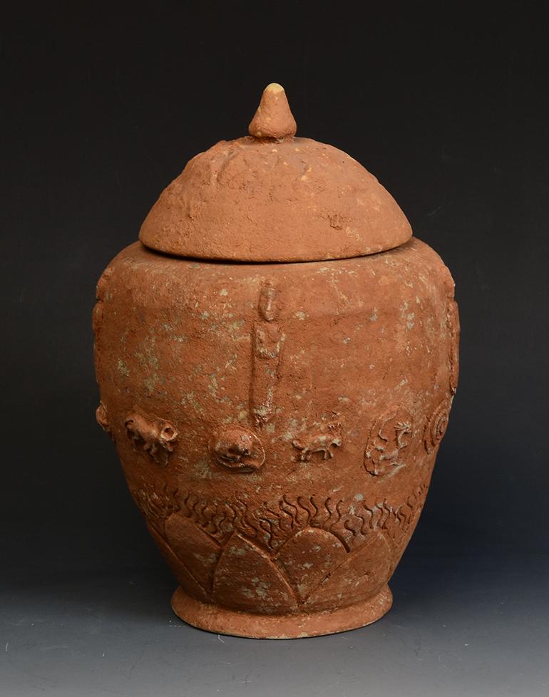 Chinese pottery lotus jar decorated with twelve zodiac animals.

Age: China, Five Dynasties, A.D.907 - 960
Size: Height 26.5 C.M. / Width 17 C.M.
Condition: Well-preserved old burial condition overall with some amount of soil adhering (some