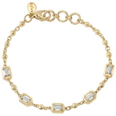 Five Emerald Cut Diamonds Set in a Handcrafted Yellow Gold Rosary Bracelet