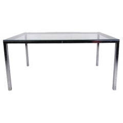 Table à manger à cinq pieds en verre et chrome