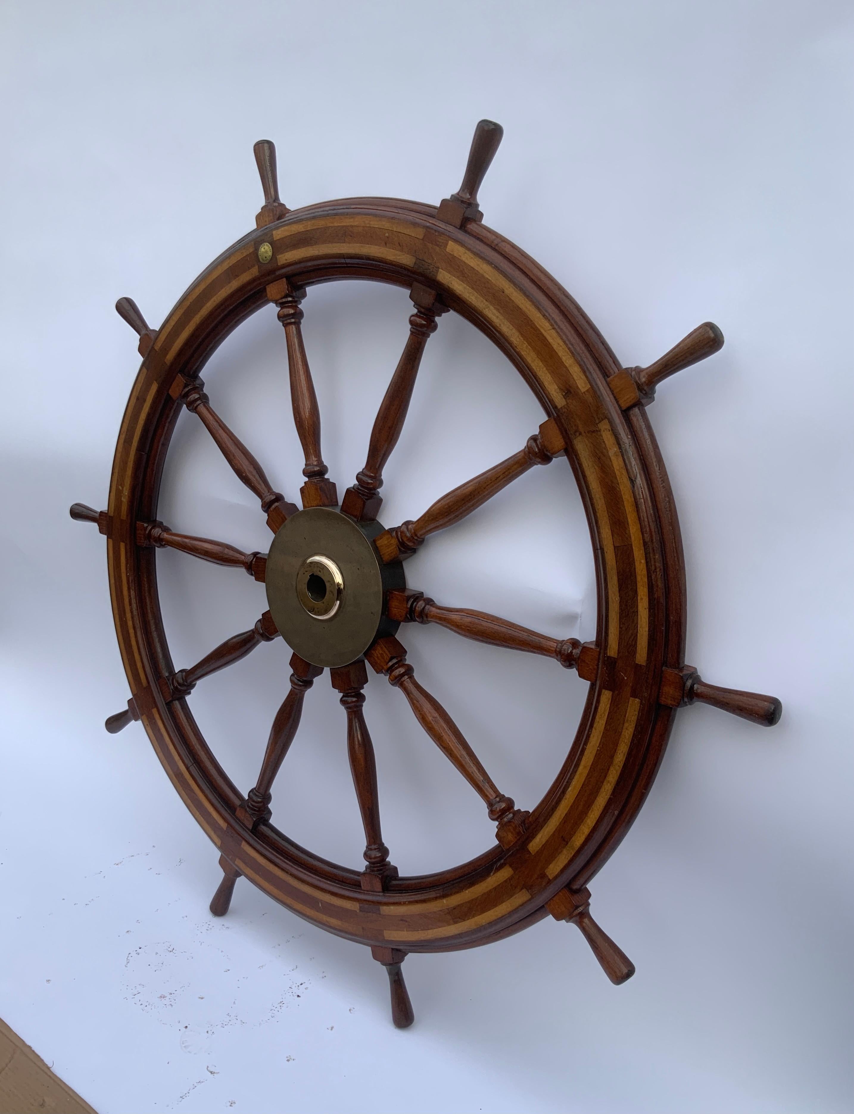 North American Five Foot Mahogany and Brass Ships Wheel For Sale