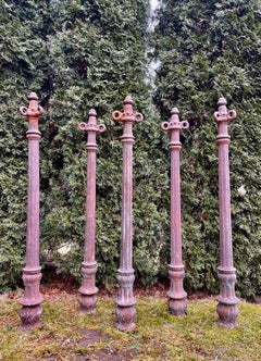 Five French Cast Iron Bollards with Elaborate Original Chain and Rosettes