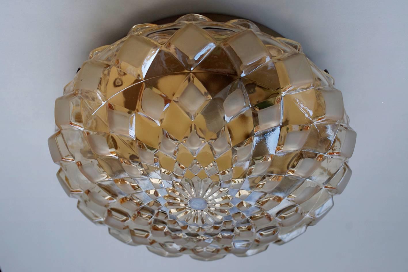 One of... amber clear and matte glass ceiling or wall flush mount.
Germany, 1960s.
Lamp sockets: 2x E27 (US E26).