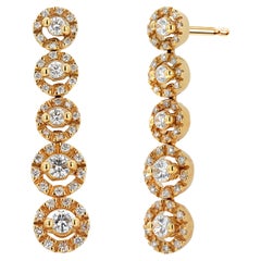 Bucherer Boucles d'oreilles en goutte en or jaune avec cinq grappes graduées de diamants