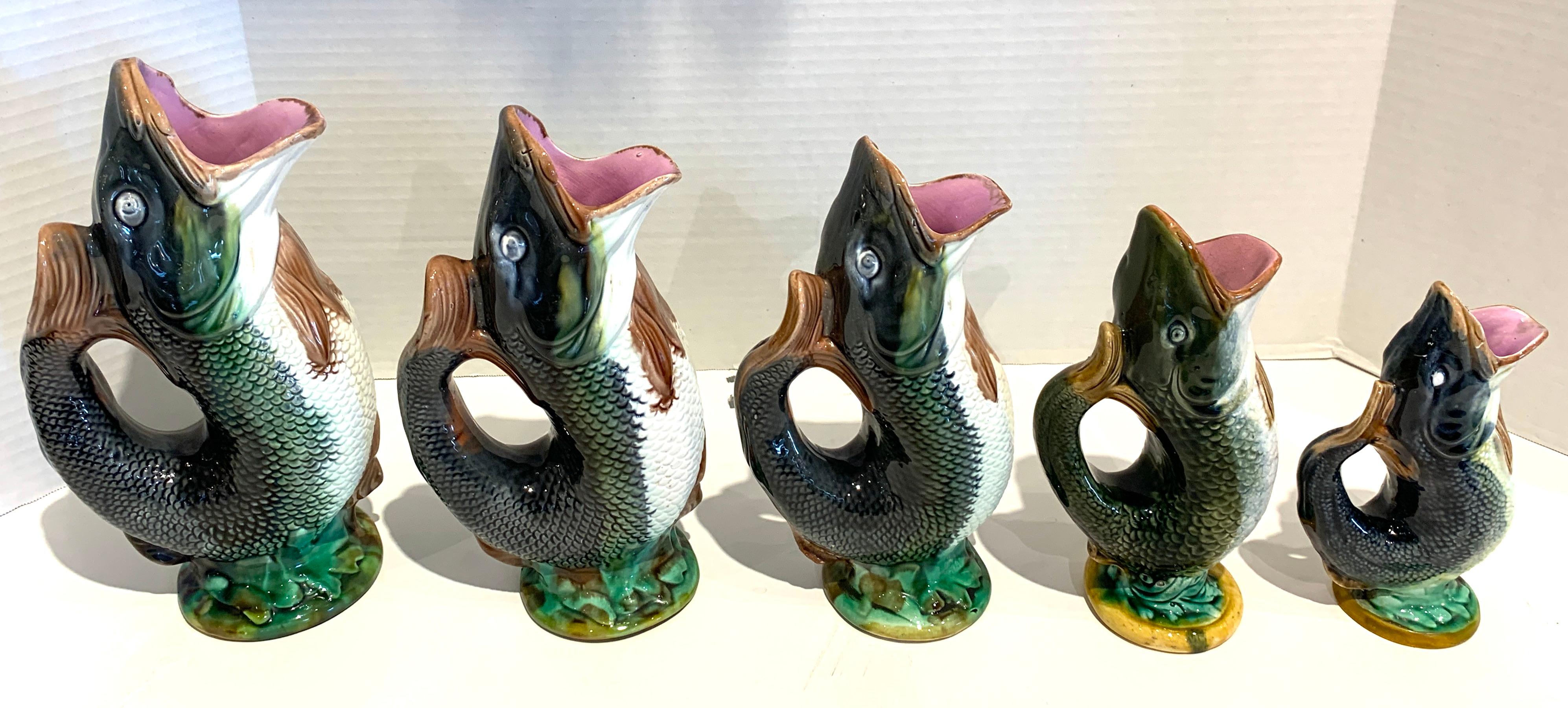 Five graduating majolica fish pitchers, by Adams & Bromley. A rare find.
Measures: Fish #1 -10.5