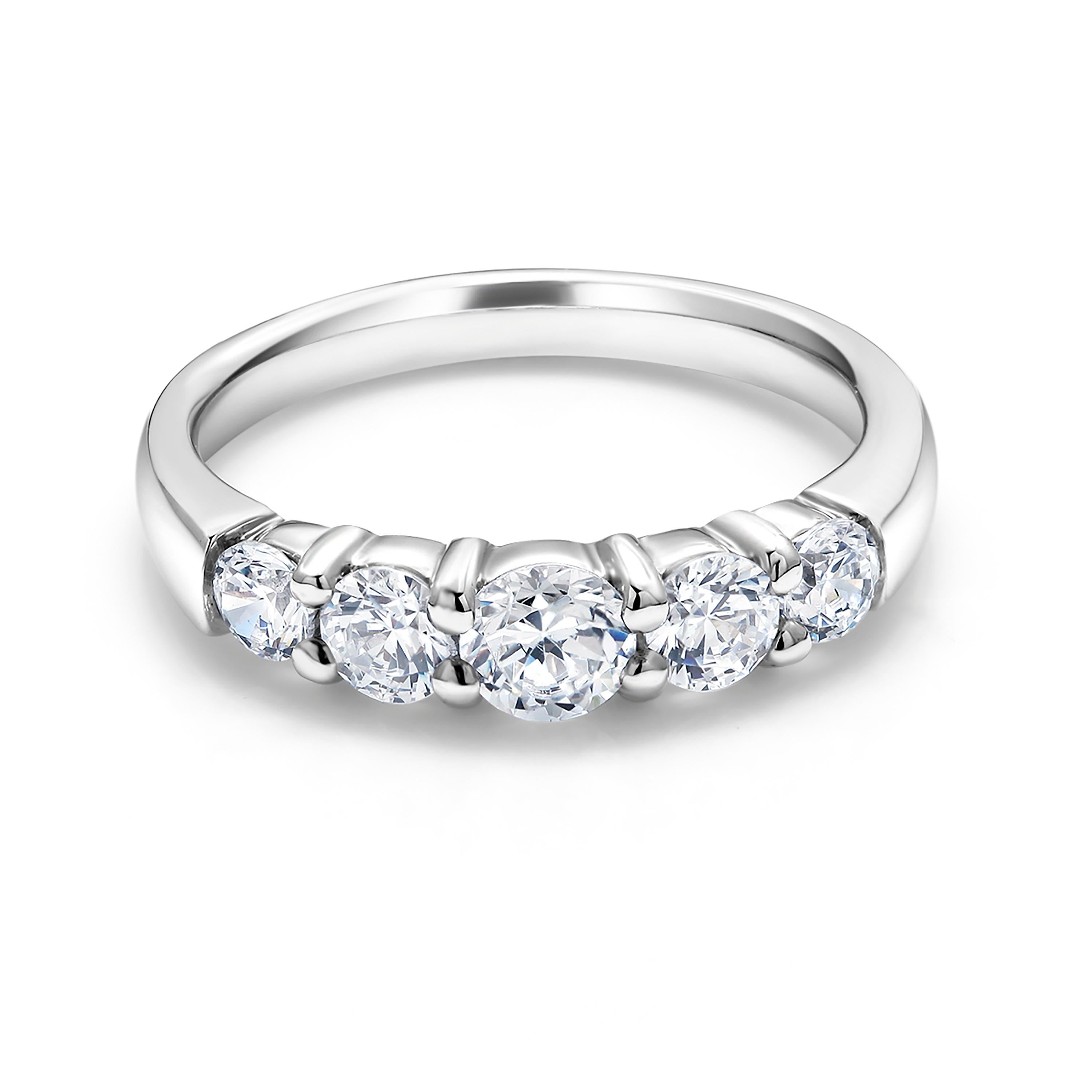 Eighteen Karats white gold graduating round diamond prong set partial ring
Five diamonds weighing 1.15 carat 
The Center diamond weighs 0.35, two side diamonds weight 0.50, and two end diamonds weight 0.30
Made to order in all finger sizes
Two weeks
