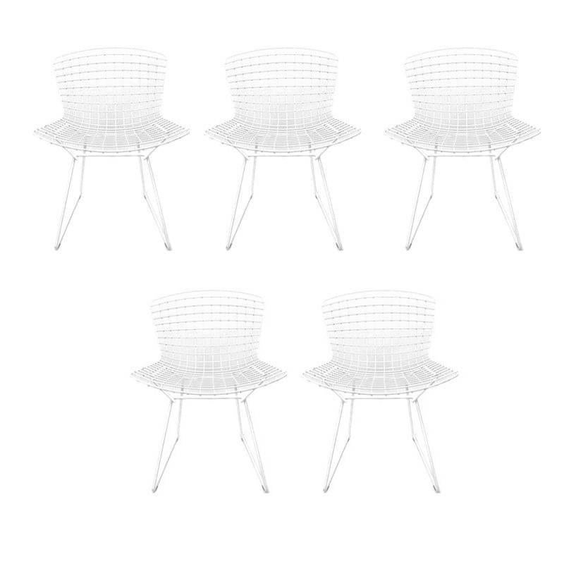 The Bertoia side chair is an icon of Mid-Century Modern design. Bertoia found sublime grace in an Industrial material, creating a design that works with every decor, in every room. Priced per chair. Five available
