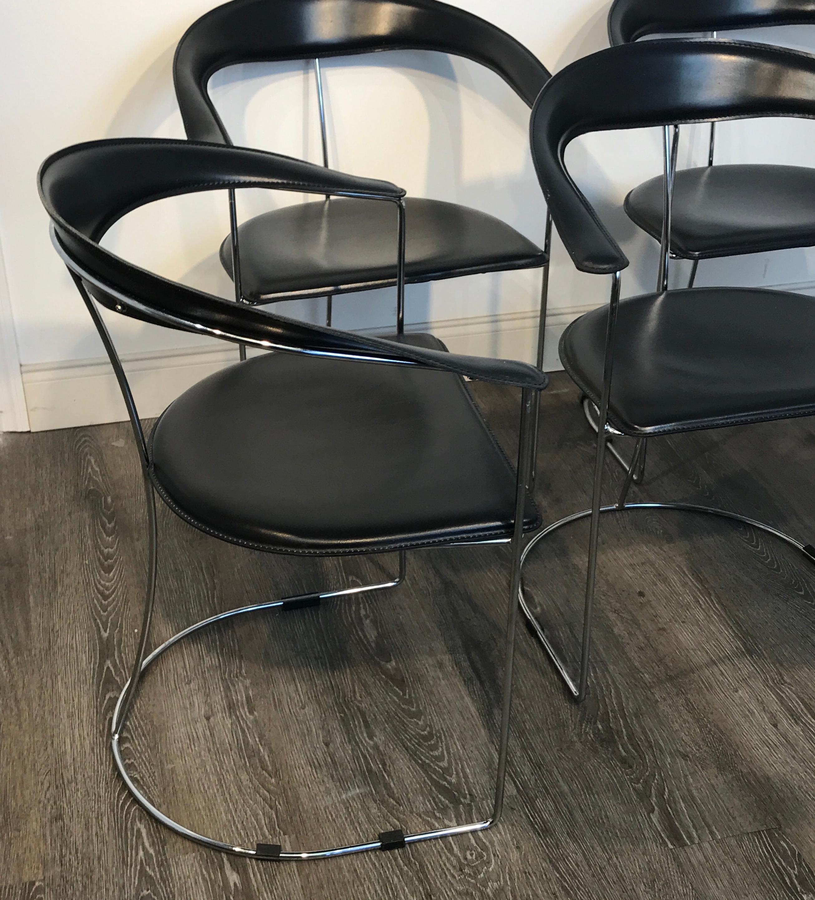 Five Italian chrome and black leather cantilever armchairs, handmade by Frag, in the style of Anton Lorenz for Thonet chairs. Arm Height is 26